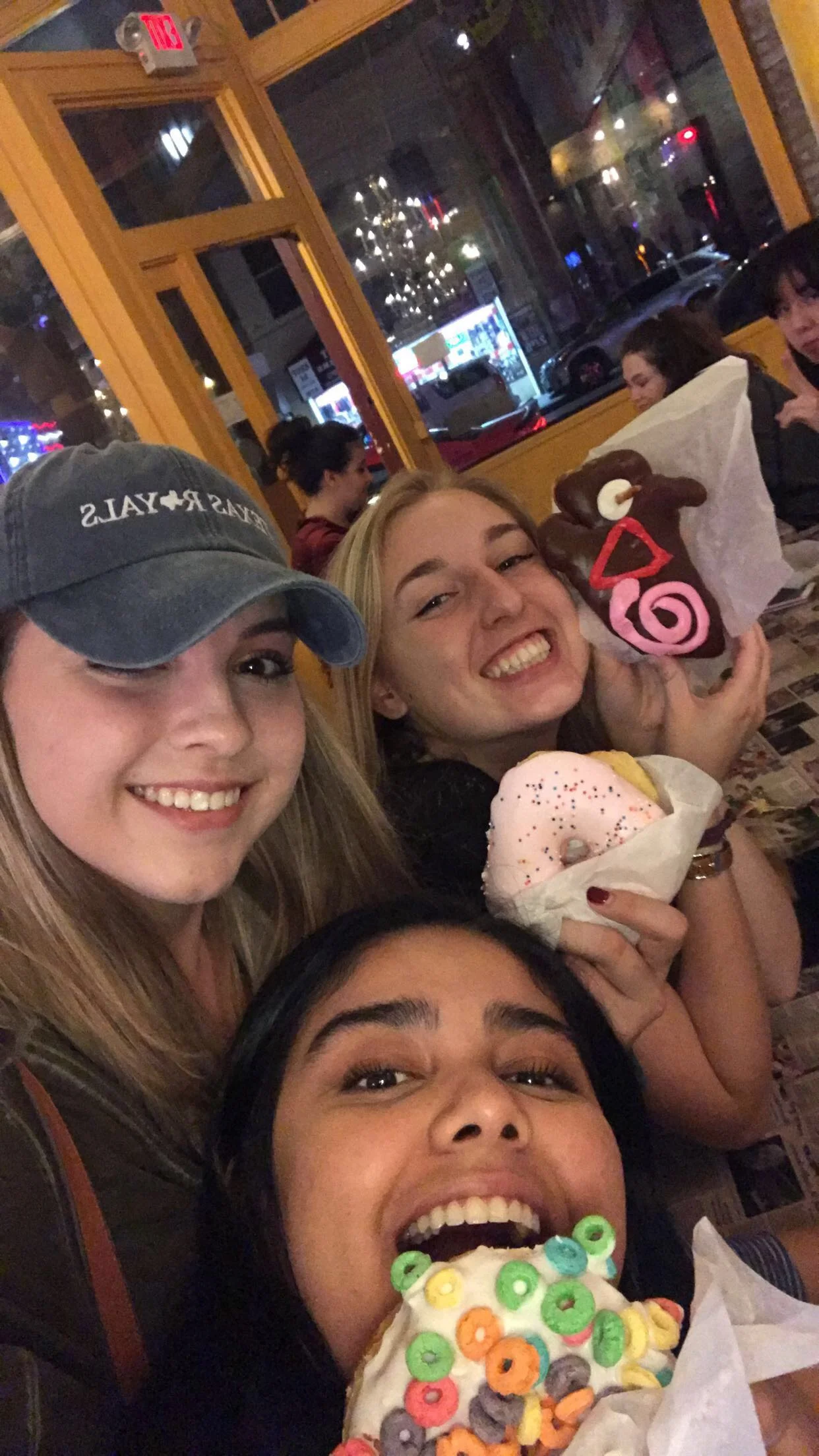 Clare, Addison, and Alisha during a donut tab Spring 2018.