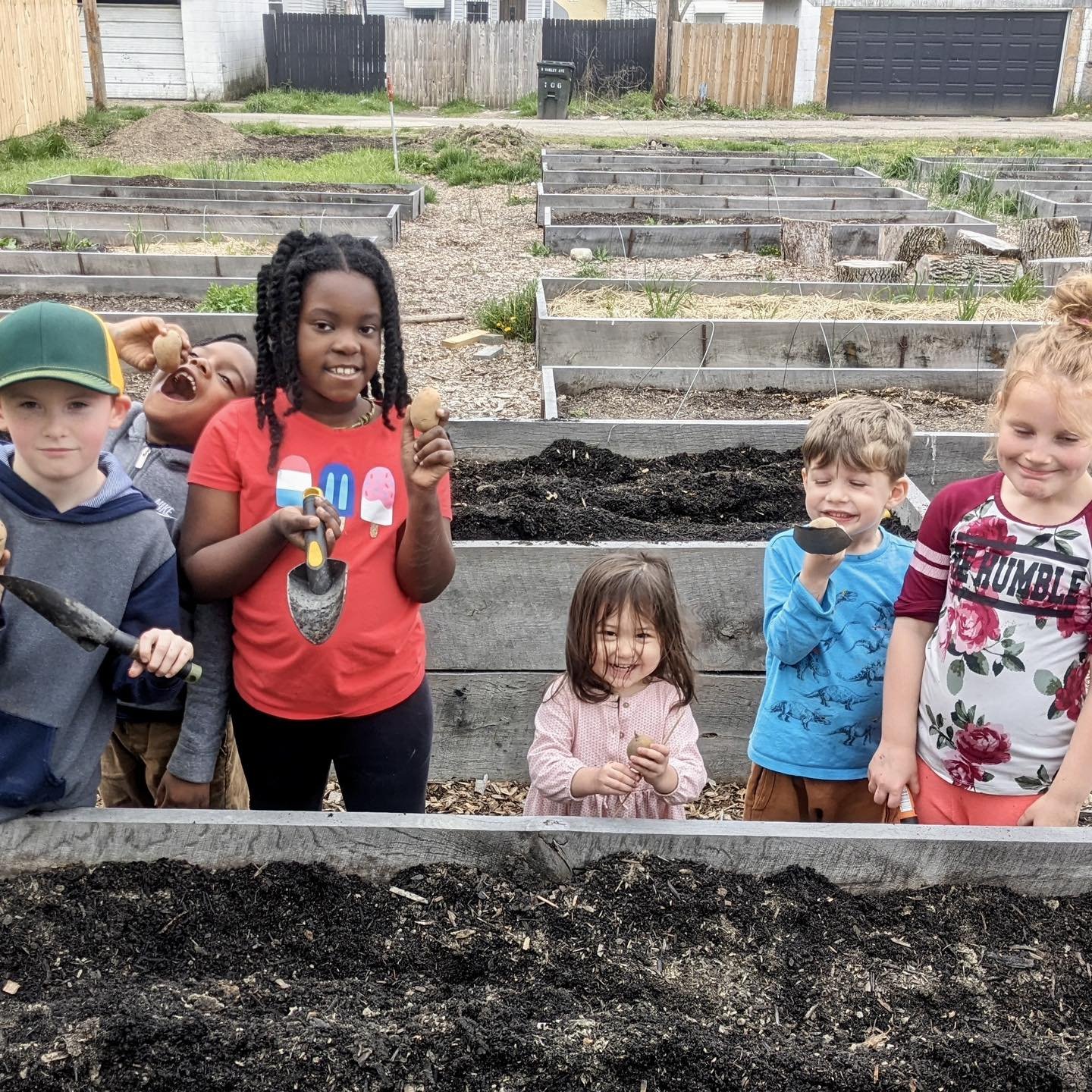 🥔 The Garden Club gang recently had a blast getting their hands dirty planting spuds! 

With Ms. Nadia as their green-thumbed guru, they carefully followed her every gardening tip. They dug, they planted, and they chatted excitedly about the mammoth