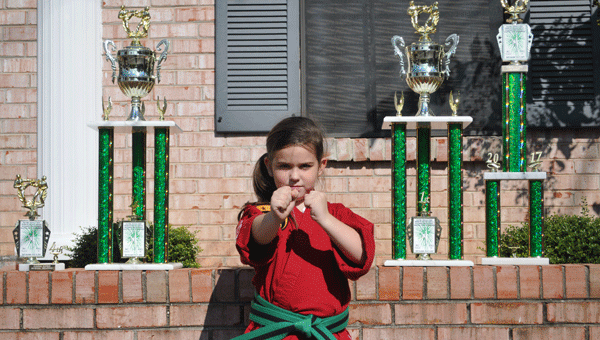 Karate green belt Dianne Sipper took home four trophies (including two first-place finishes) from the National Open Martial Arts Championship in Columbus, Ga.