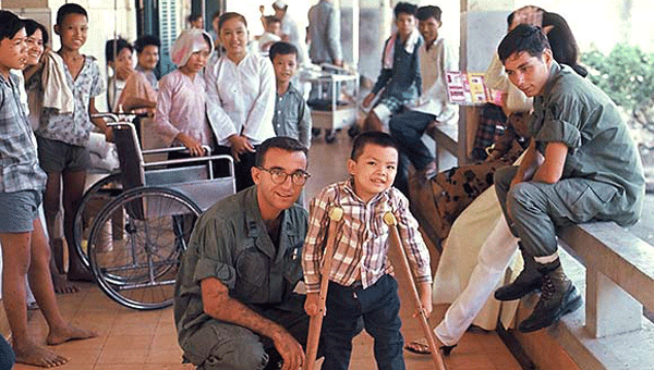 Dr. Sheldon Kushner, left, is pictured with one of his favorite patients, a Vietnamese boy named Loc, in 1968. Kushner recently published a book detailing his year in Vietnam, called “Trauma and Tenacity in Vietnam: A Surgeon’s Story. 