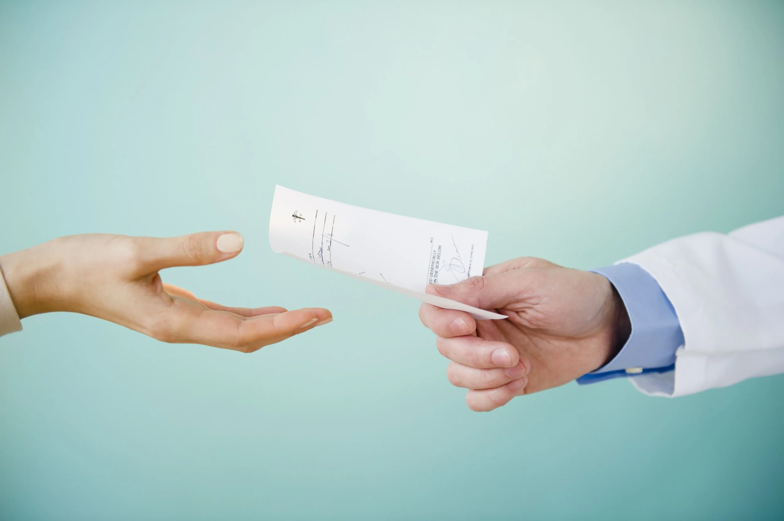 close-up-of-doctor-s-hand-giving-prescription-to-patient-studio-shot-149262483-5877e1b73df78c17b62c3376.jpg