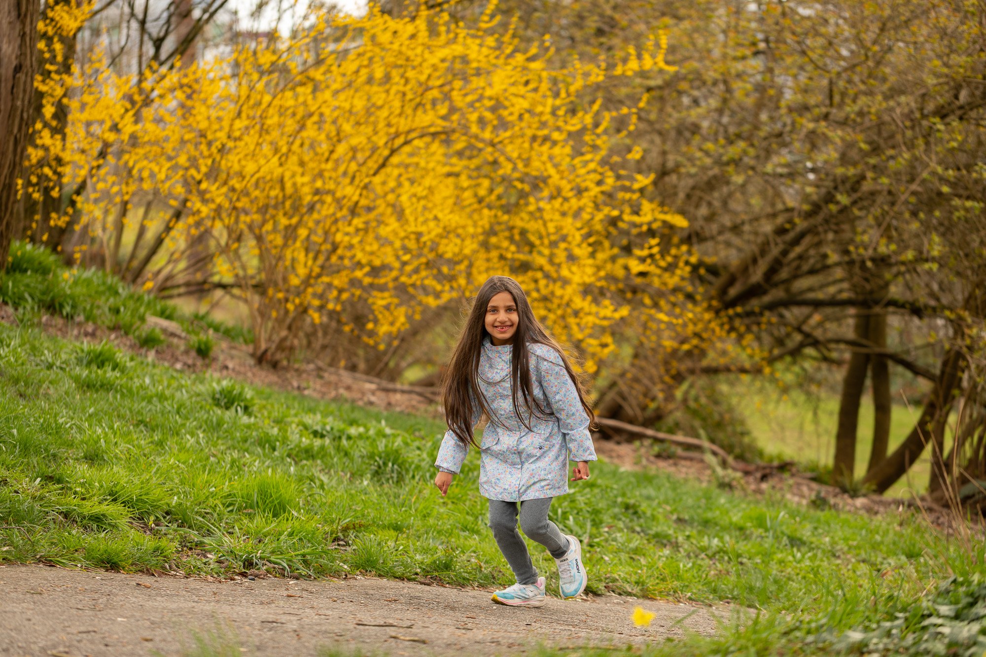 Kid running in nature, Vancouver, BC