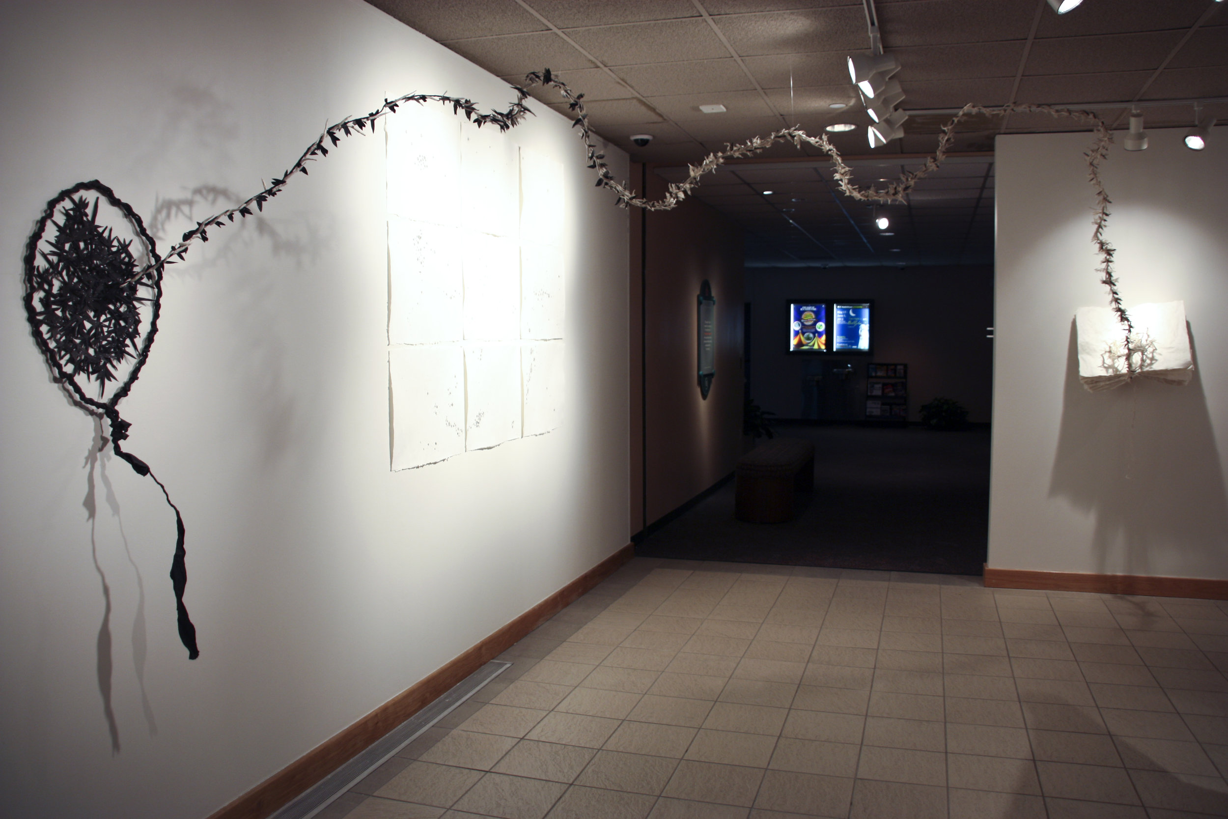    they keep me  , 2013 installation view  handmade paper (kozo, abaca), raw paper mulberry, handmade paperclay, watercolor, linen thread size variable; roughly 15’ in length  Irving Arts Center 