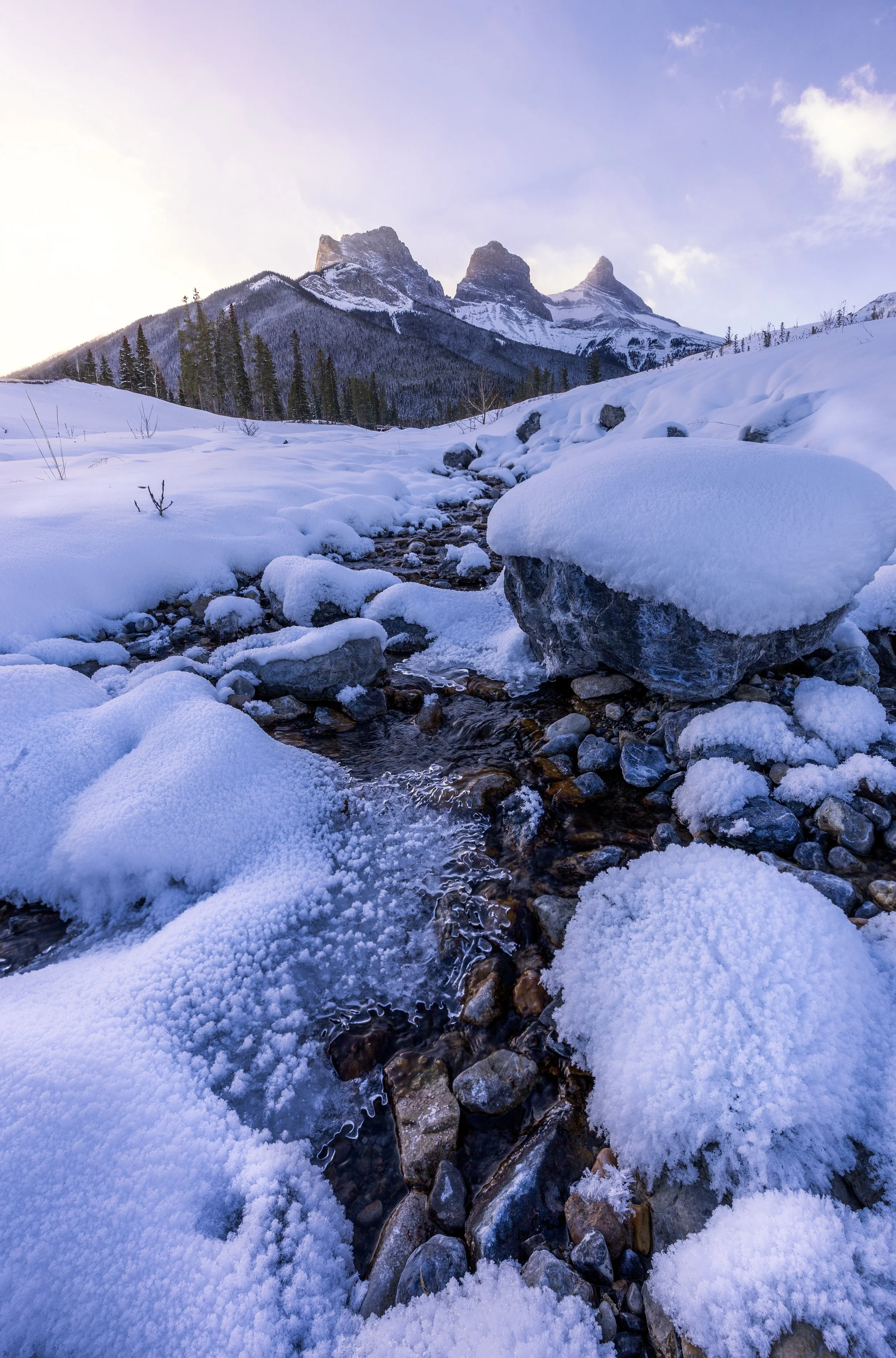 A Secret Creek Running Towards the 3 sisters in Canmore