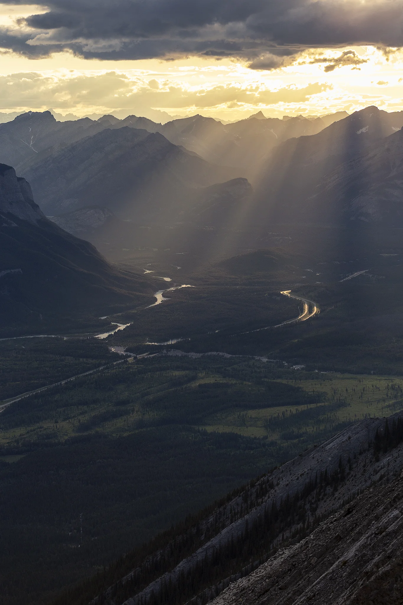 Sun beams through the valley, another view before the ridge line.