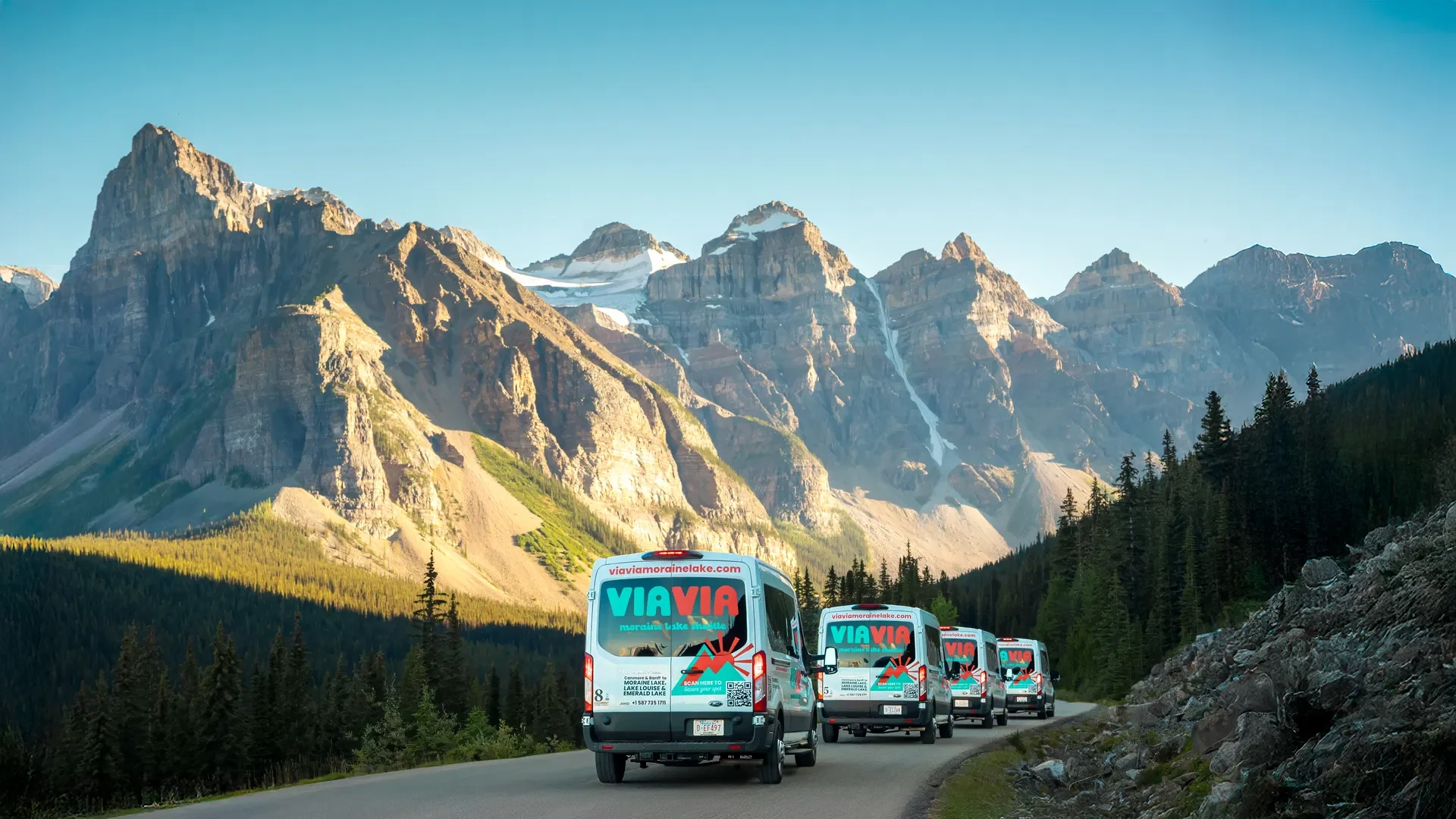 Via Via tour buses on the way to Moraine Lake