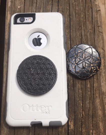 Cellphone orgonite disc radiation protector.png