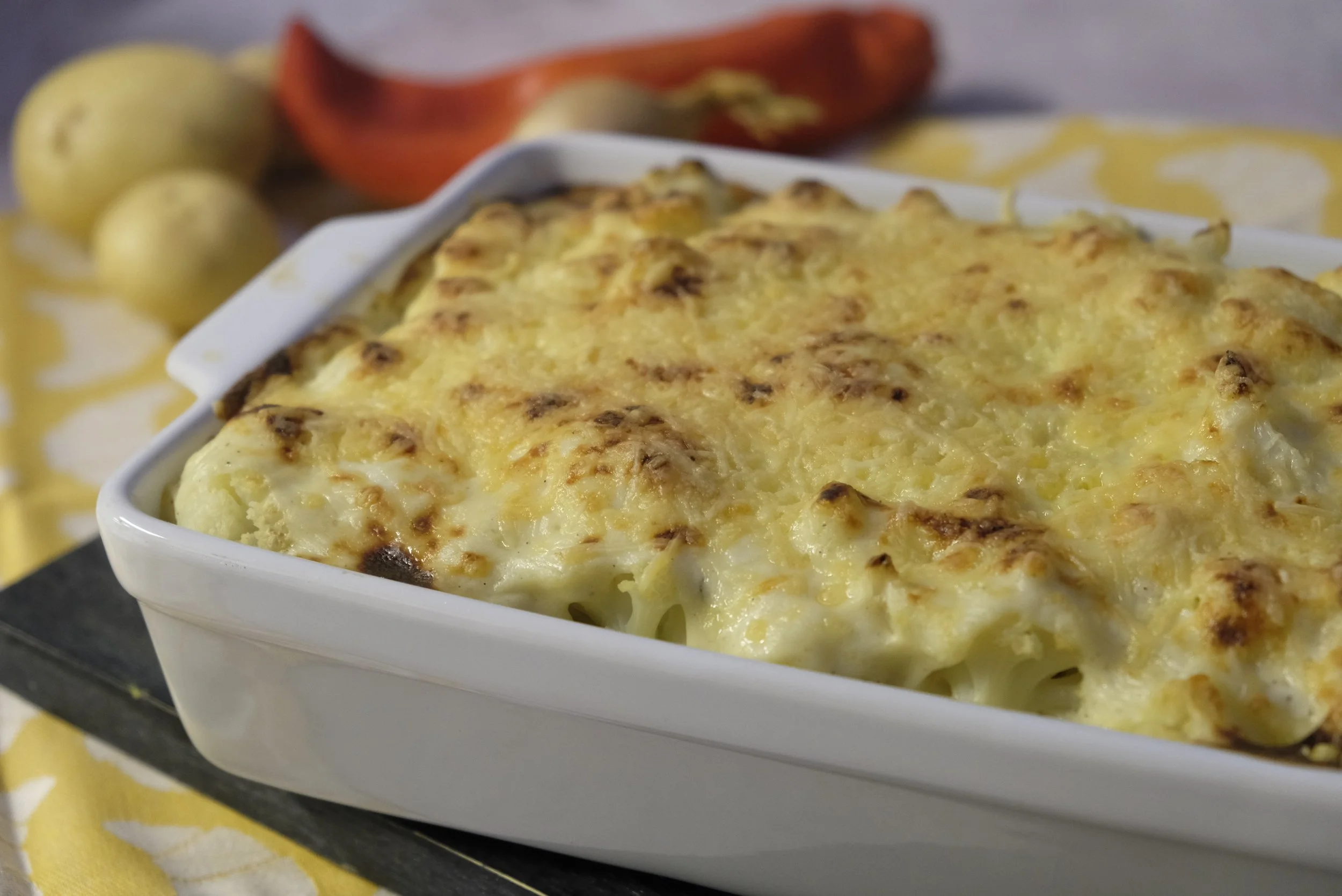 Ovenschotel met bloemkool, gehakt en puree