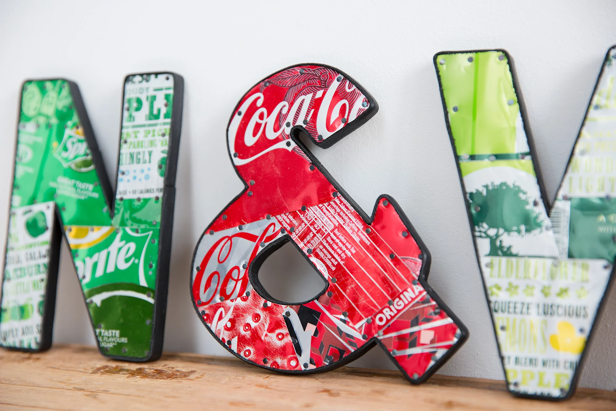 N & coca cola cans recycled art sign