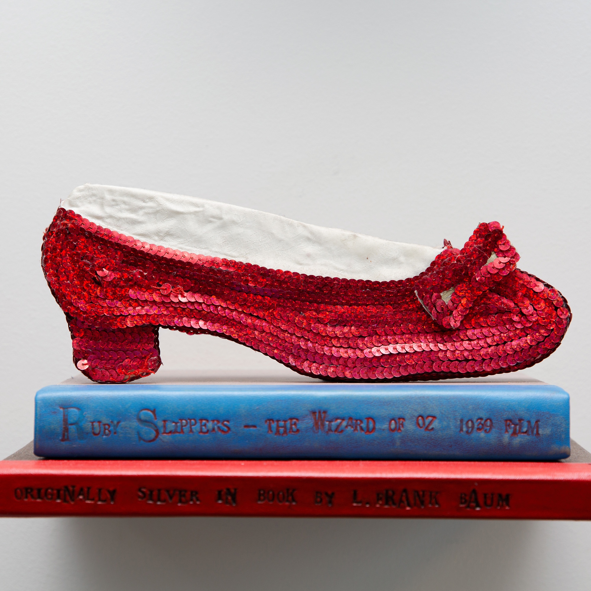 hand made two dimensional red shoe in art display