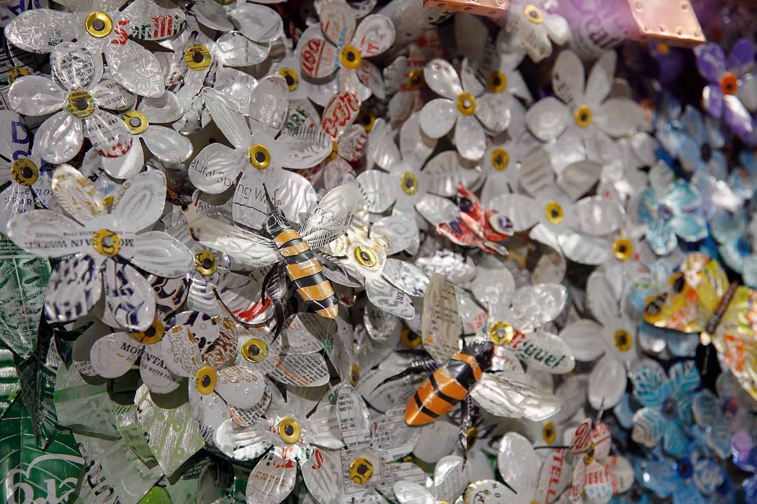 bees on white metal flowers.jpg