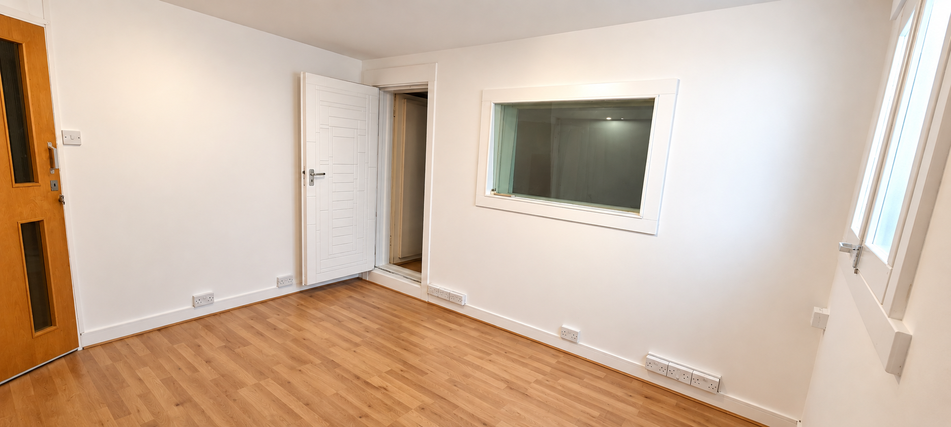 Minimalist Studio Room Interior.png