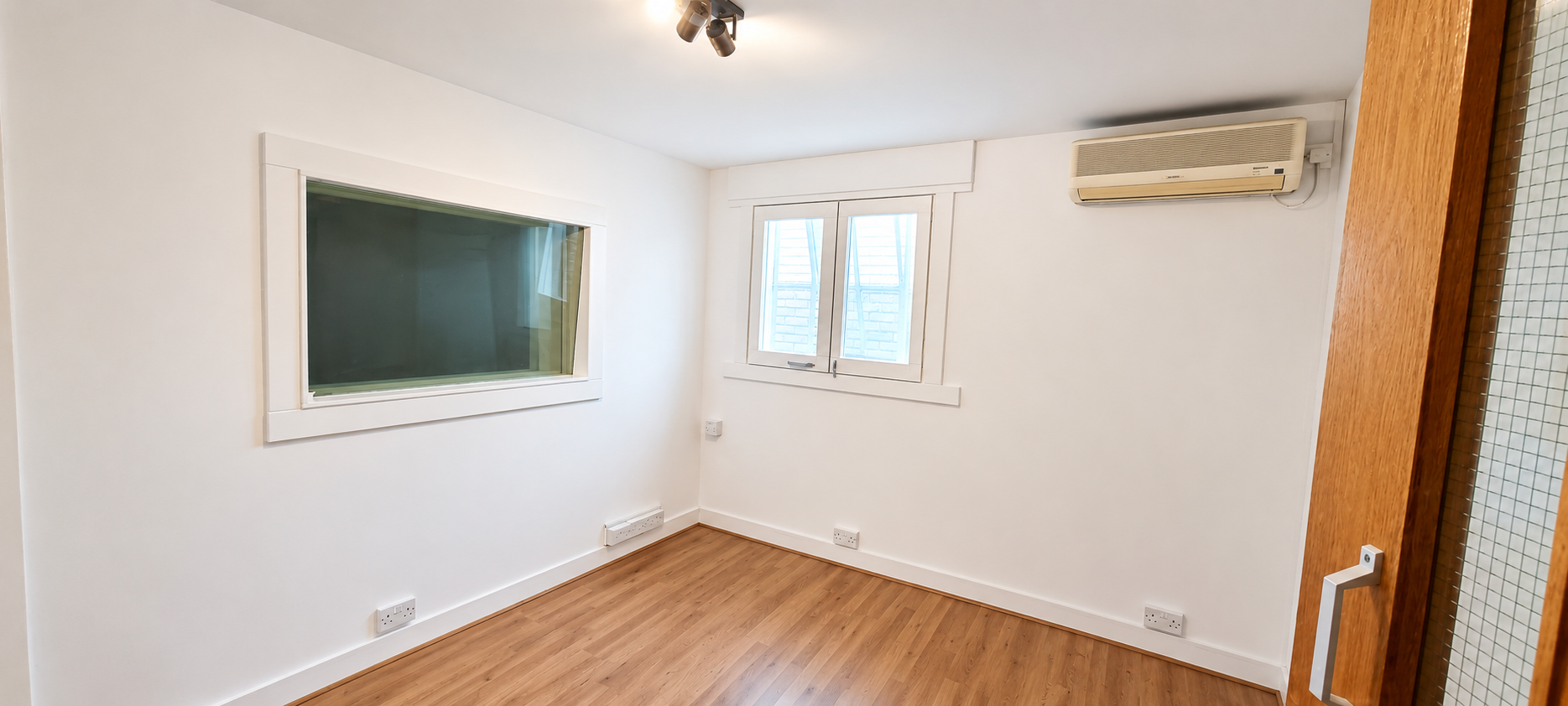 Bright Minimal Studio Office Interior.png