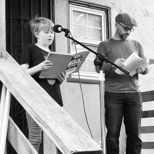 taylor Brady REads poetry in the Oak Center Neighborhood of West oakland on April 6th 2018. At the 12:50 mark in the recording, Laurel Evje-Karn reads a poem. Photo by Amy Evje.