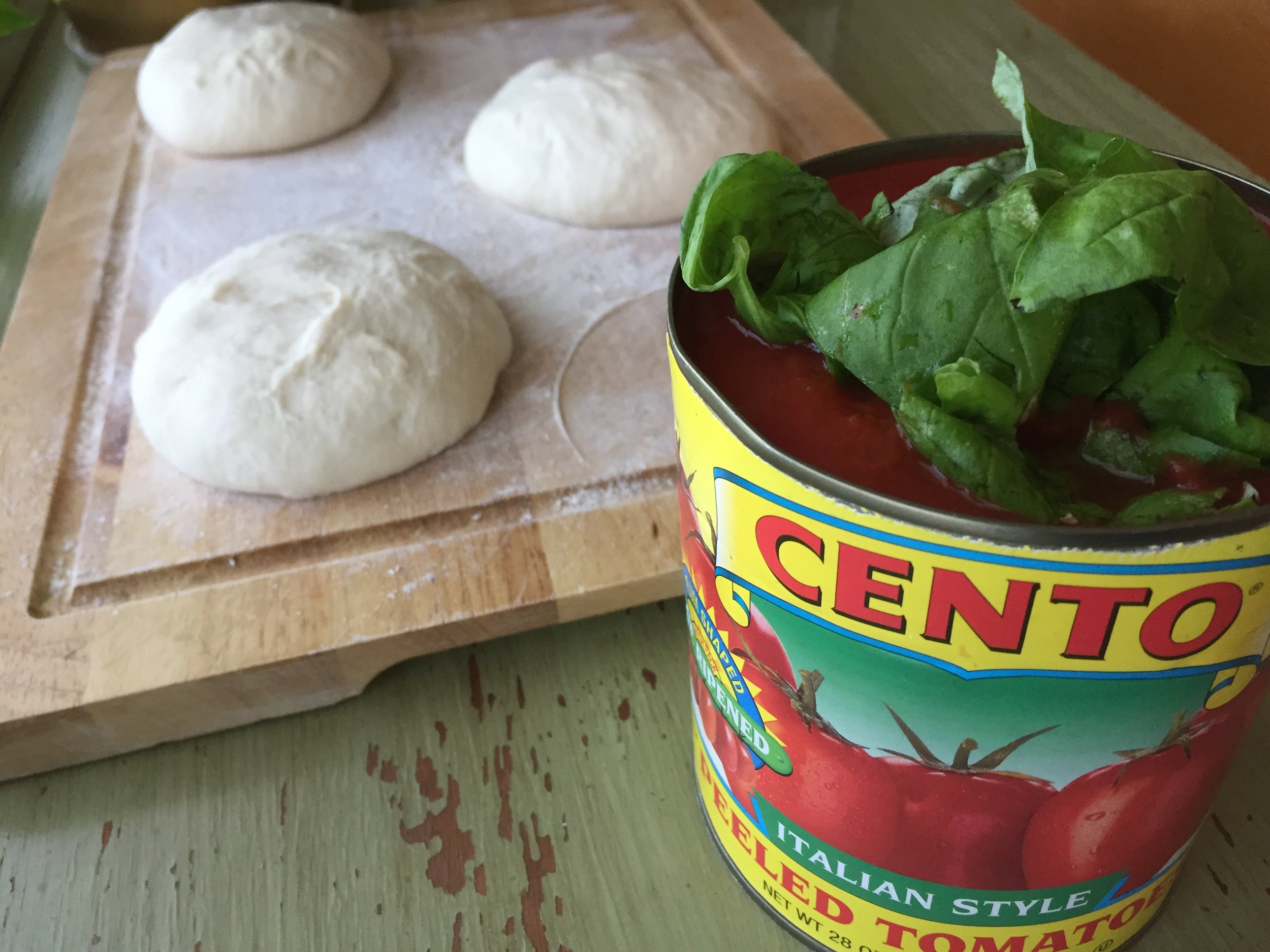  While the dough is resting, prepare your sauce and toppings.  