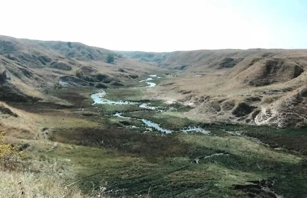 The headwaters of White Tail Creek northeast of Lake McConaughy flowing from the top of the Ogallala aquifer
