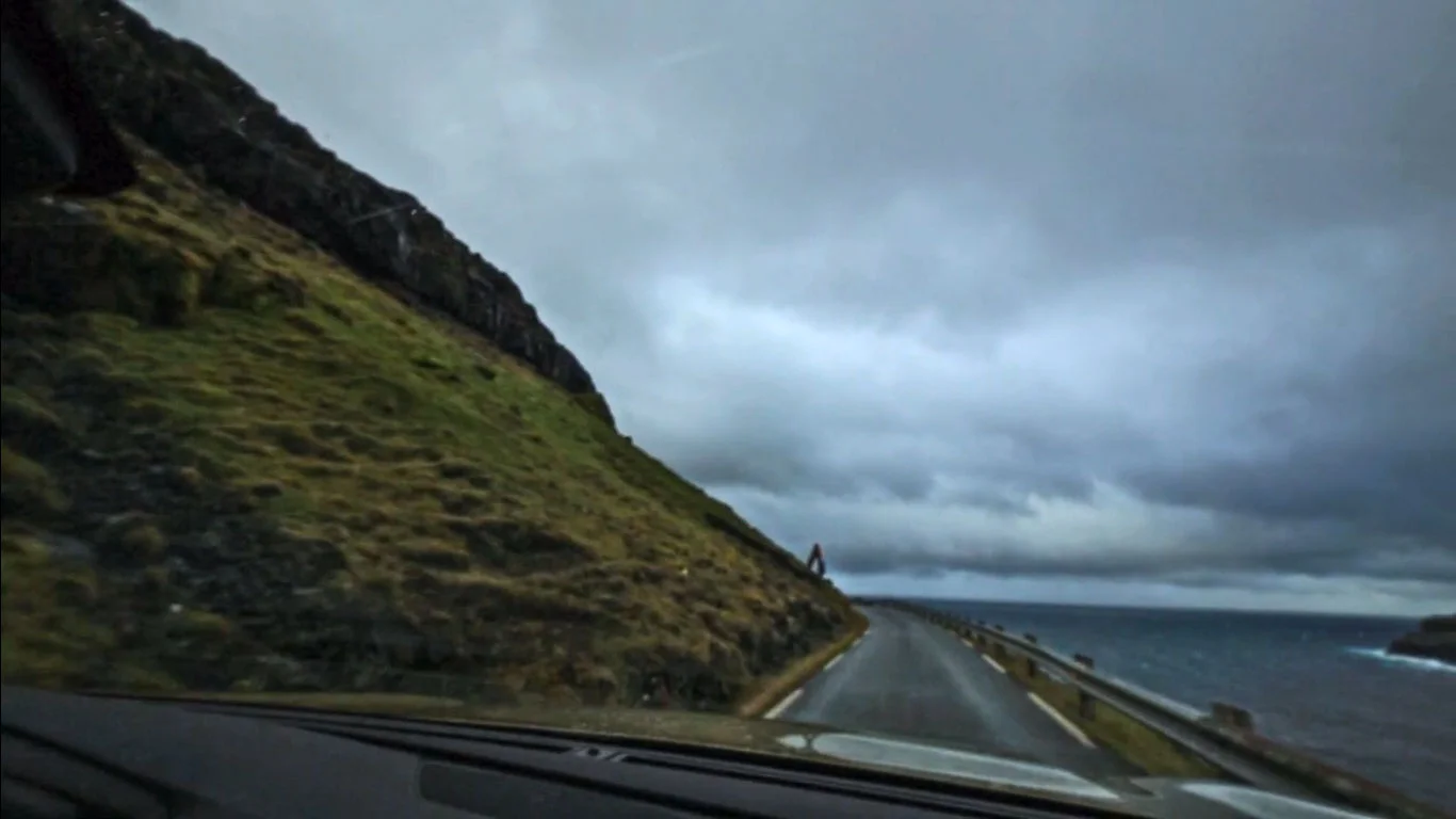 Driving out toward Tjørnuvík, we rounded a bend to find a giant excavator starting work on a tunnel. Just one guy out there, building a tunnel.