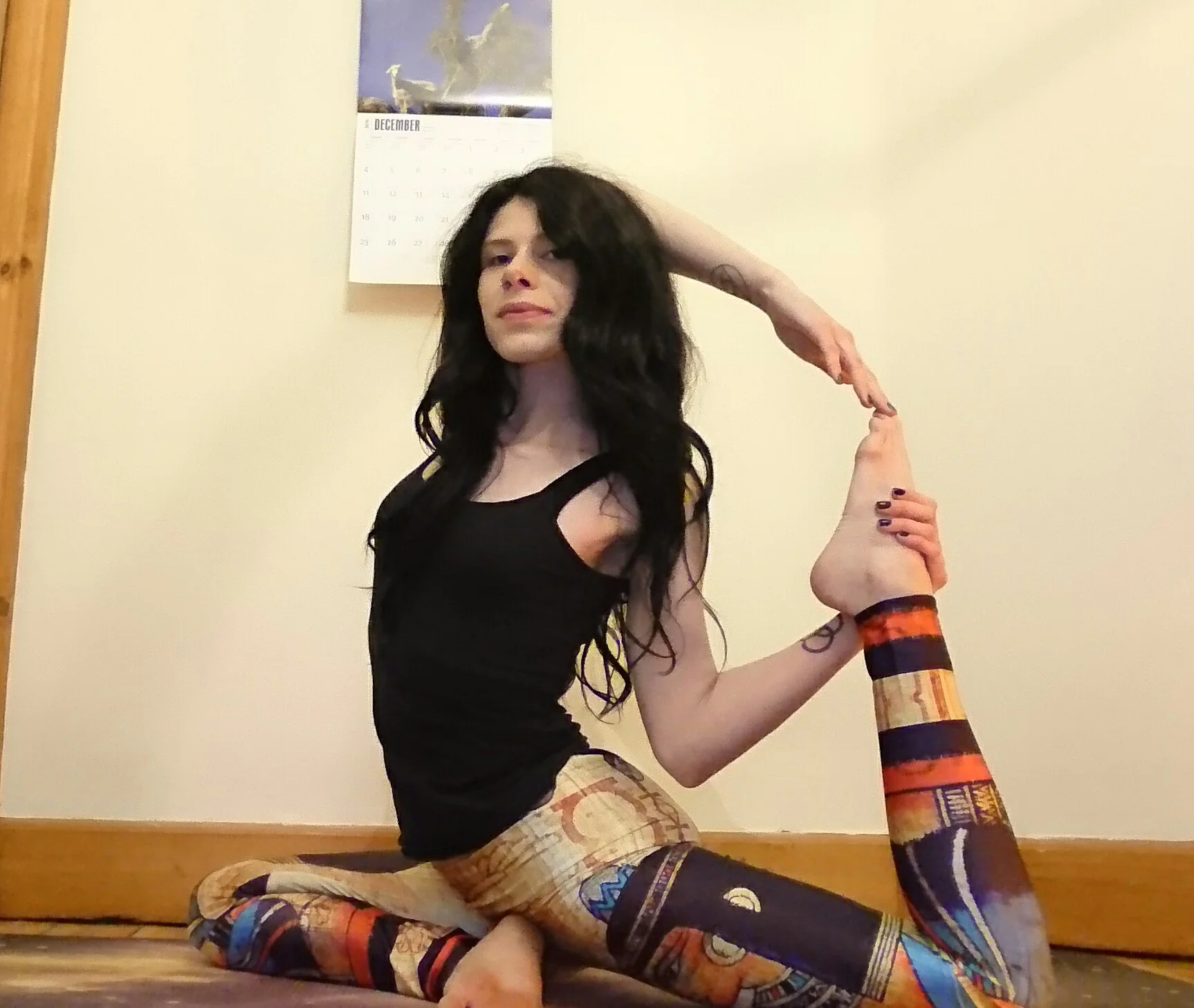 Now you can attempt to take both hands away by reaching your supporting arm back and trying to find your toes! So if you’re in Pigeon Pose with your right leg in front, keep your left hand on your left foot, and try to reach your right fingers to your left toes!