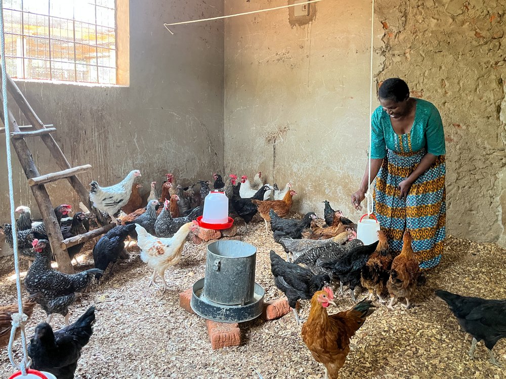WITH HER CHICKENS