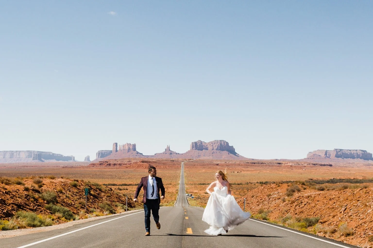 Married Couple Runs through the Desert.jpg