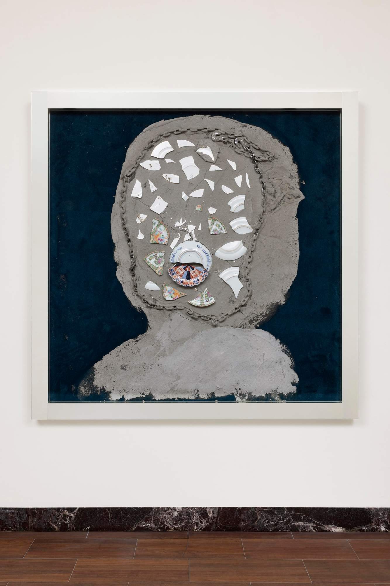 The Invisibles, aka Streets is Watching, N, Milan, 2022 Concrete, porcelain plates, chain on rug in mirror frame 73 × 73 × 5 inches $ 125,000.00 USD (excl. taxes and transport fees)