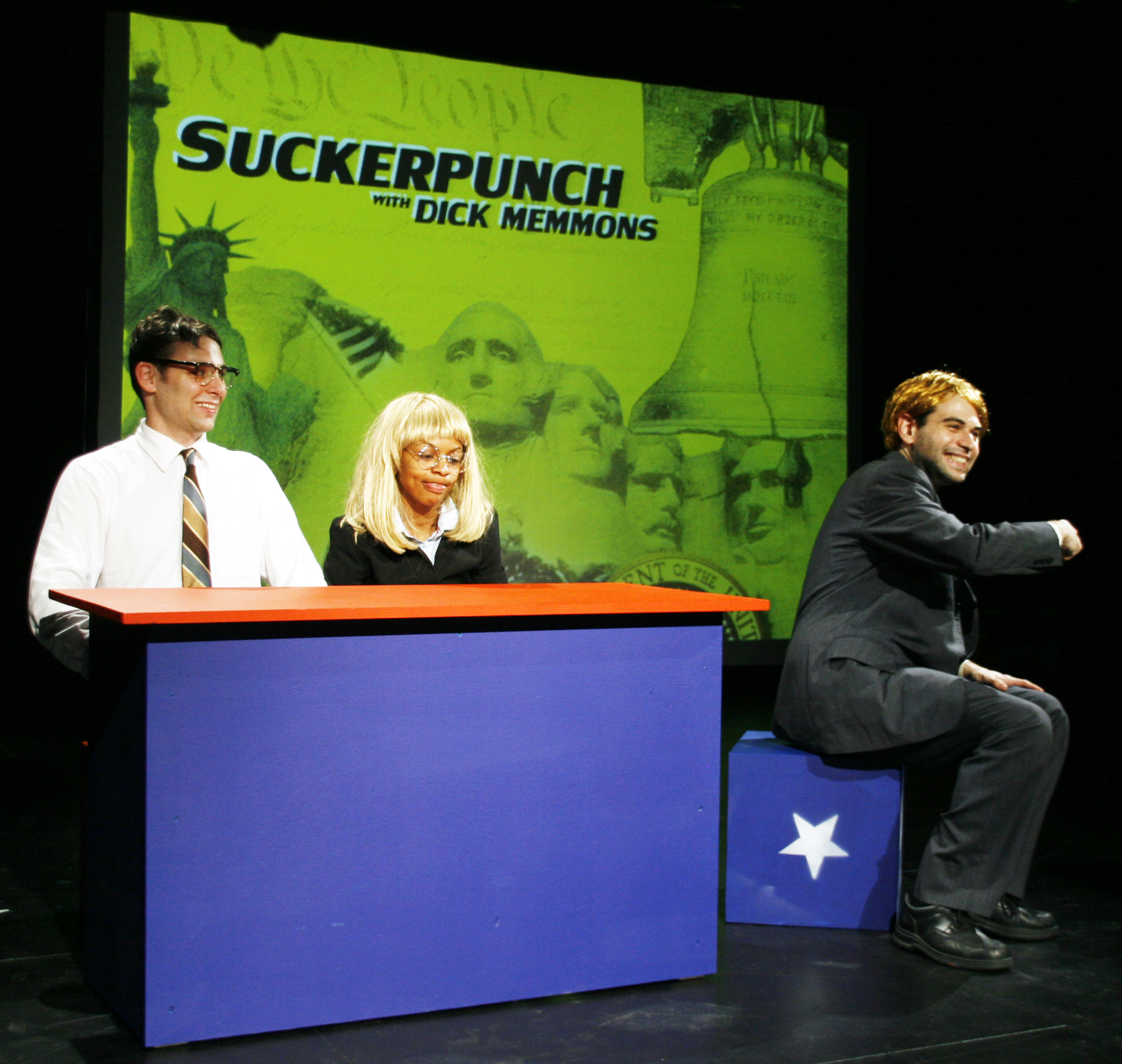 As cable news pundit Dick Memmons in Life After Bush , with Avi Phillips and Sadrina Renee as panelists. Photo by Tor-Evert Johanssen.