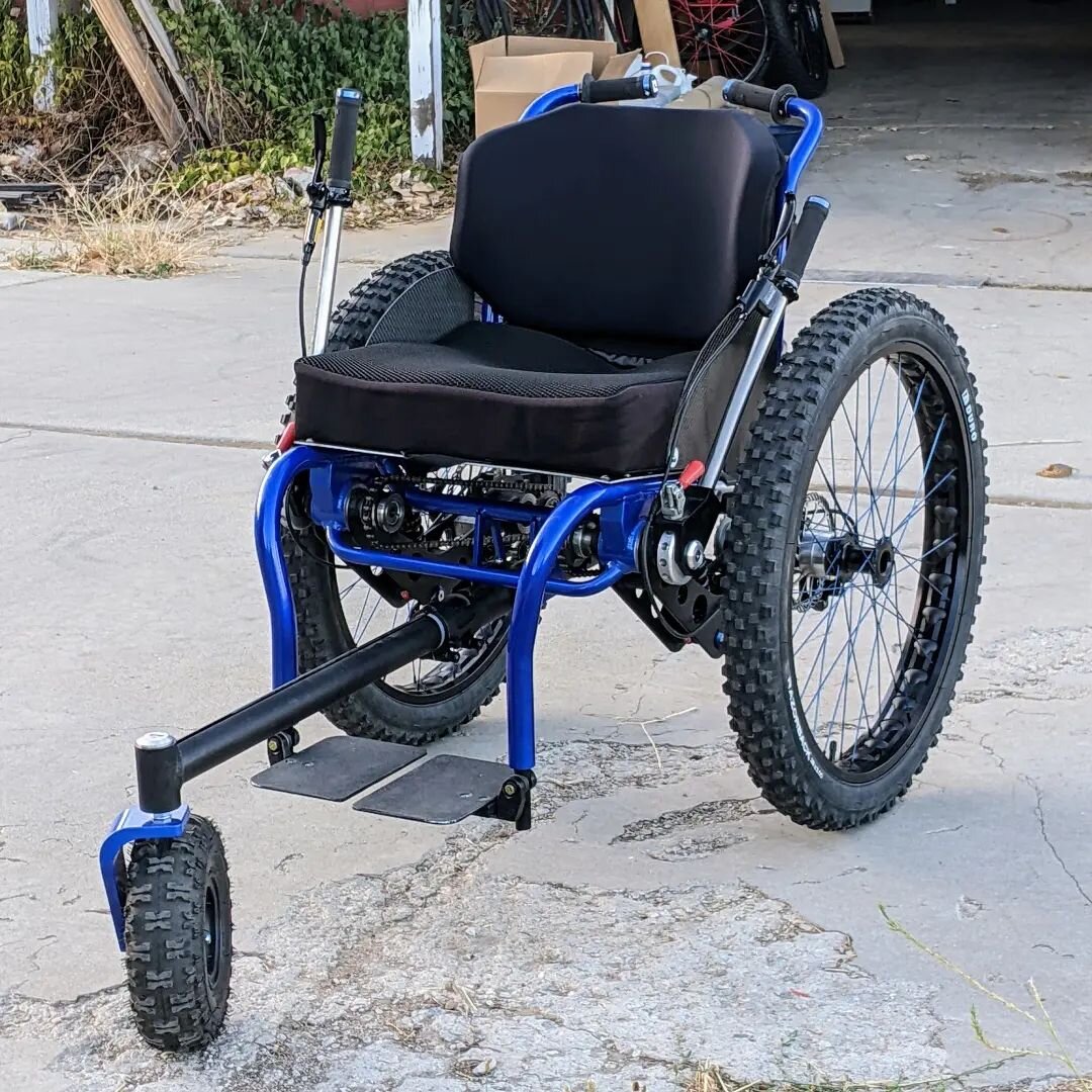 One of our URSA hiking chairs with Suspension, Tow kit and of course Disc Brakes, Retractable front wheel, on the fly drive system engagement and disengagement, Folding ADI Carbon Fiber backrest