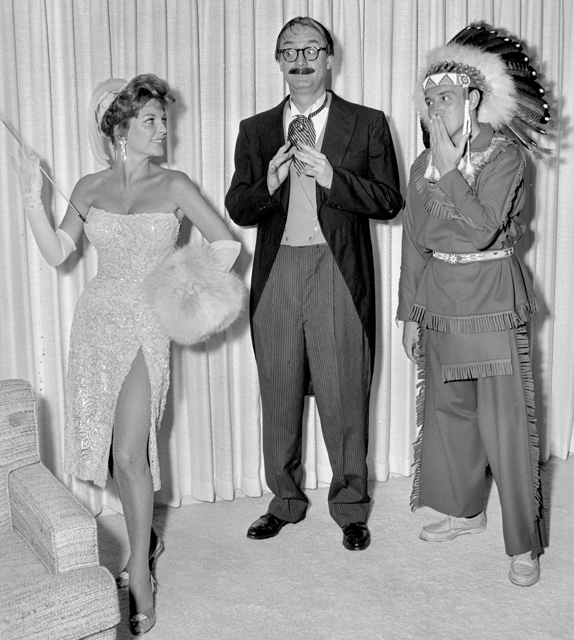 Julie London, Steve Allen, and Roger at a costume fundraiser party hosted by Roger