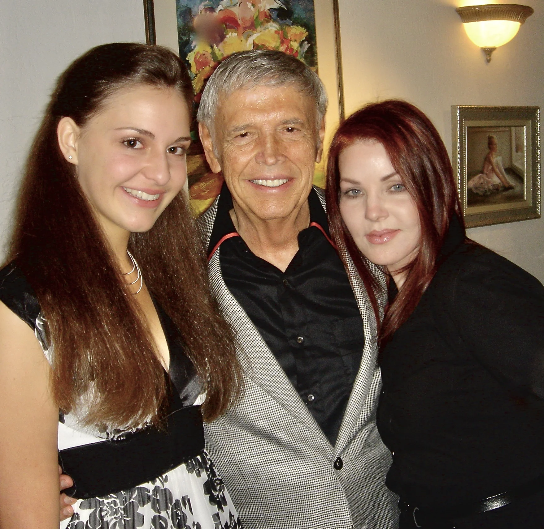 Roger, his granddaughter, and Priscilla Presley