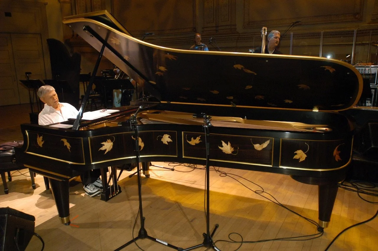 Roger performing on Steinway's Autumn Leaves piano