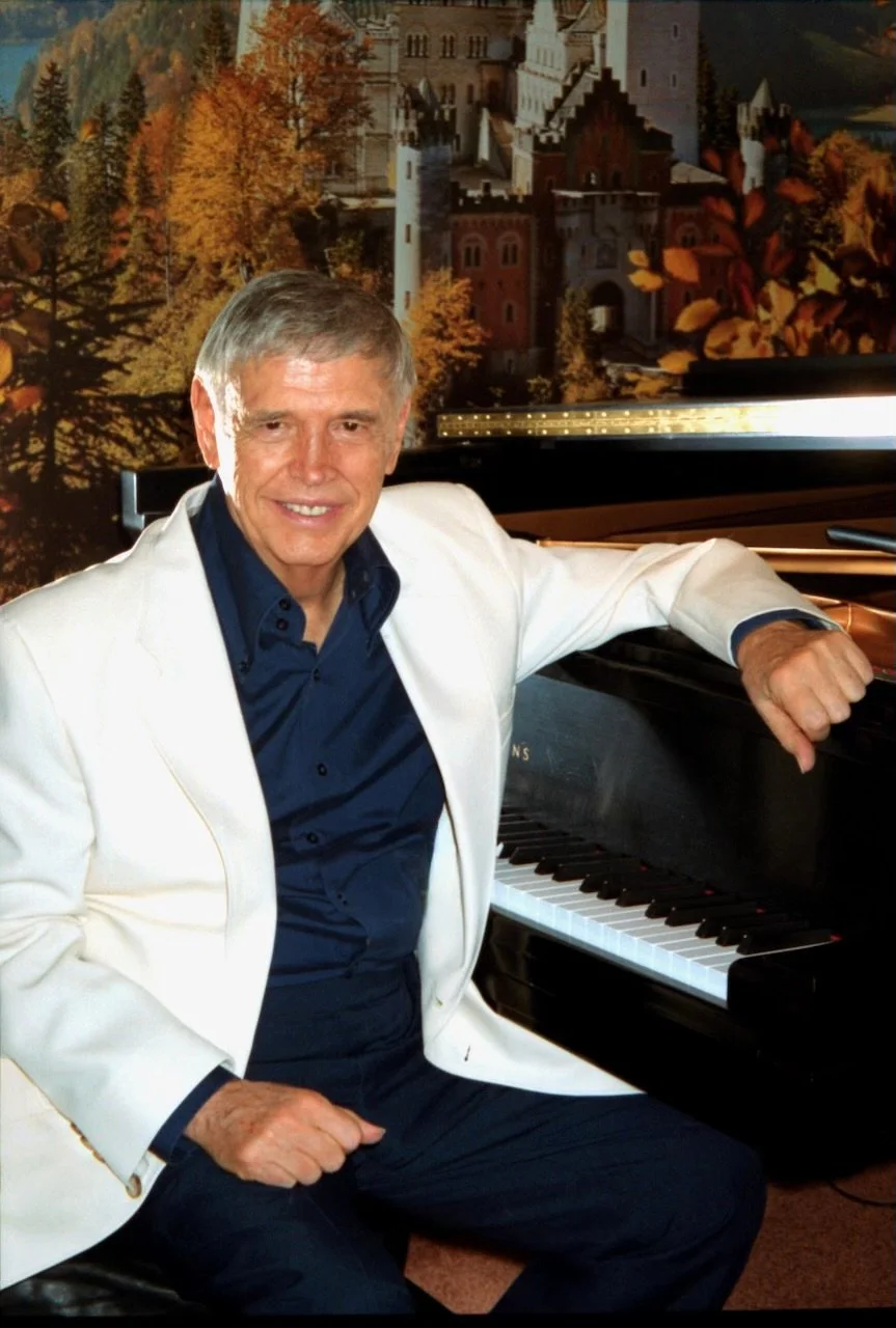 Roger at the piano.jpeg