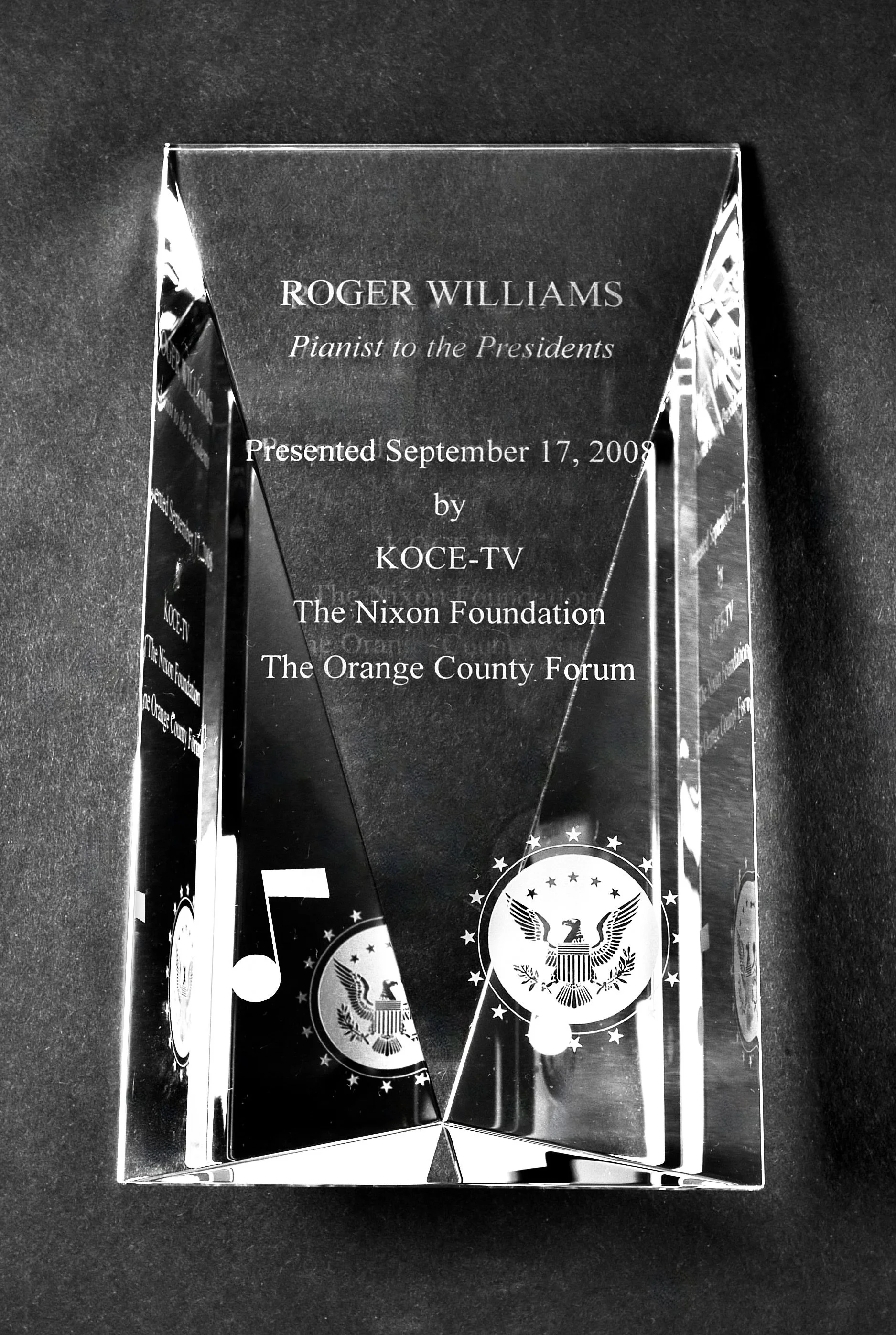 Roger received the "Pianist to the Presidents Award" in 2010 having performed for 9 US Presidents