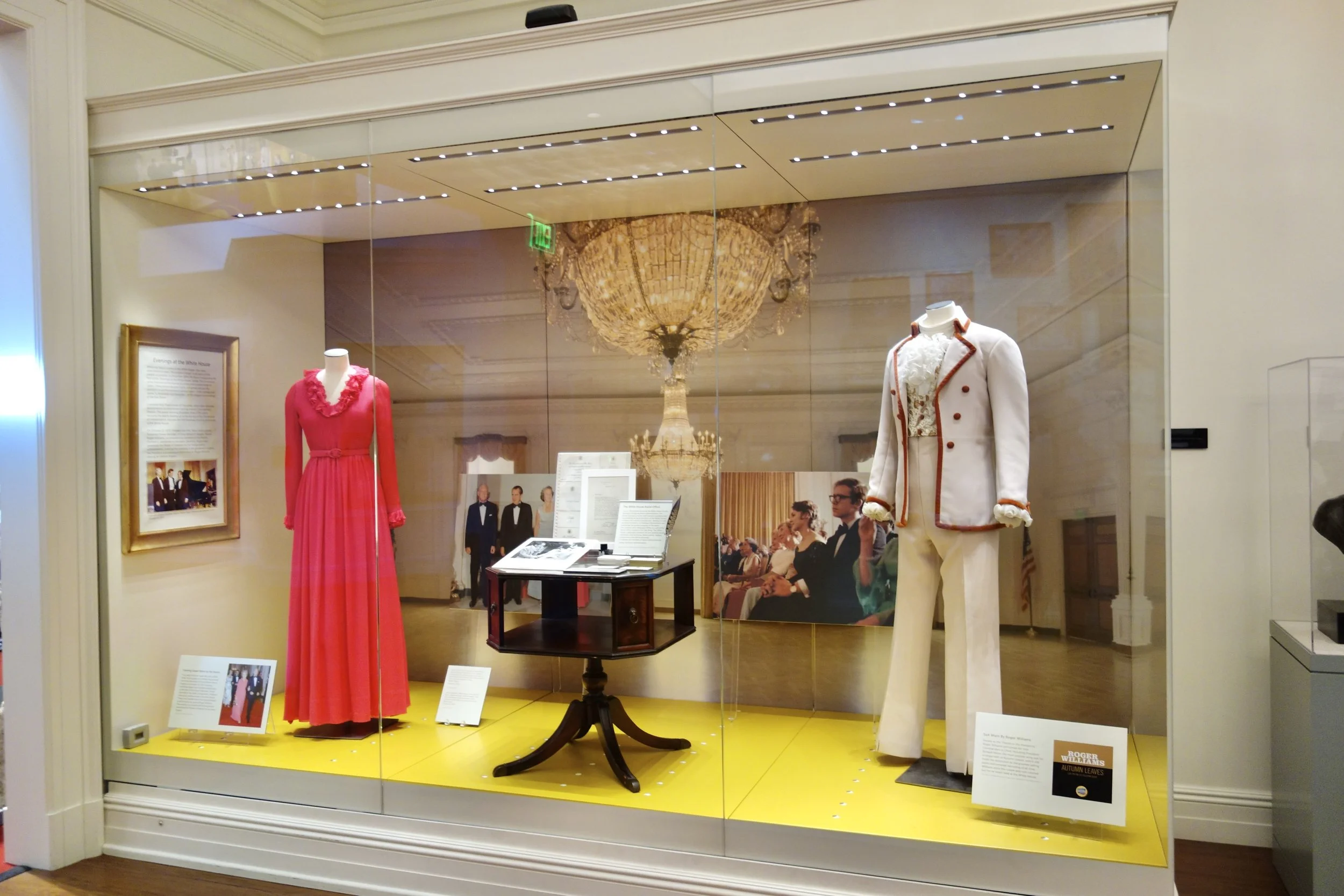 The Nixon Library display of First Lady, Pat Nixon’s gown and Roger’s costume worn for his White House performance in 1973
