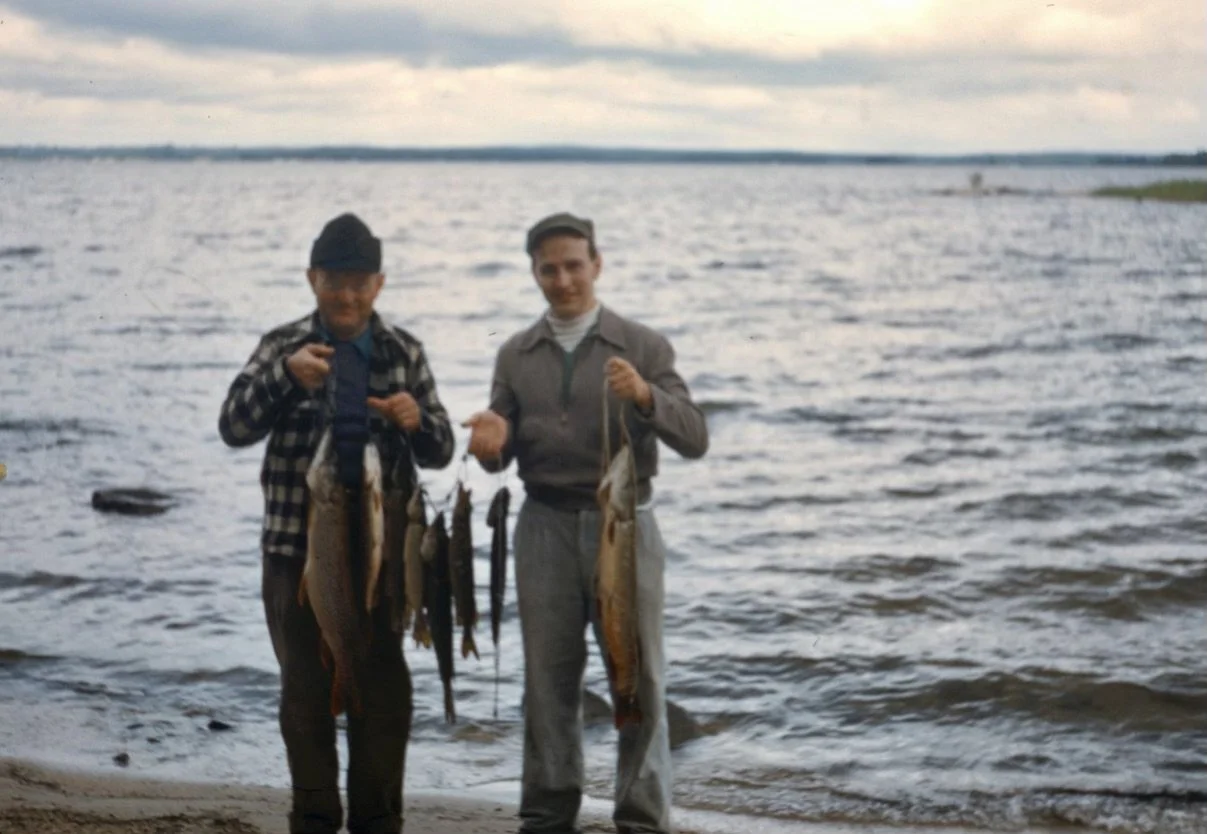 Roger and his father fishing