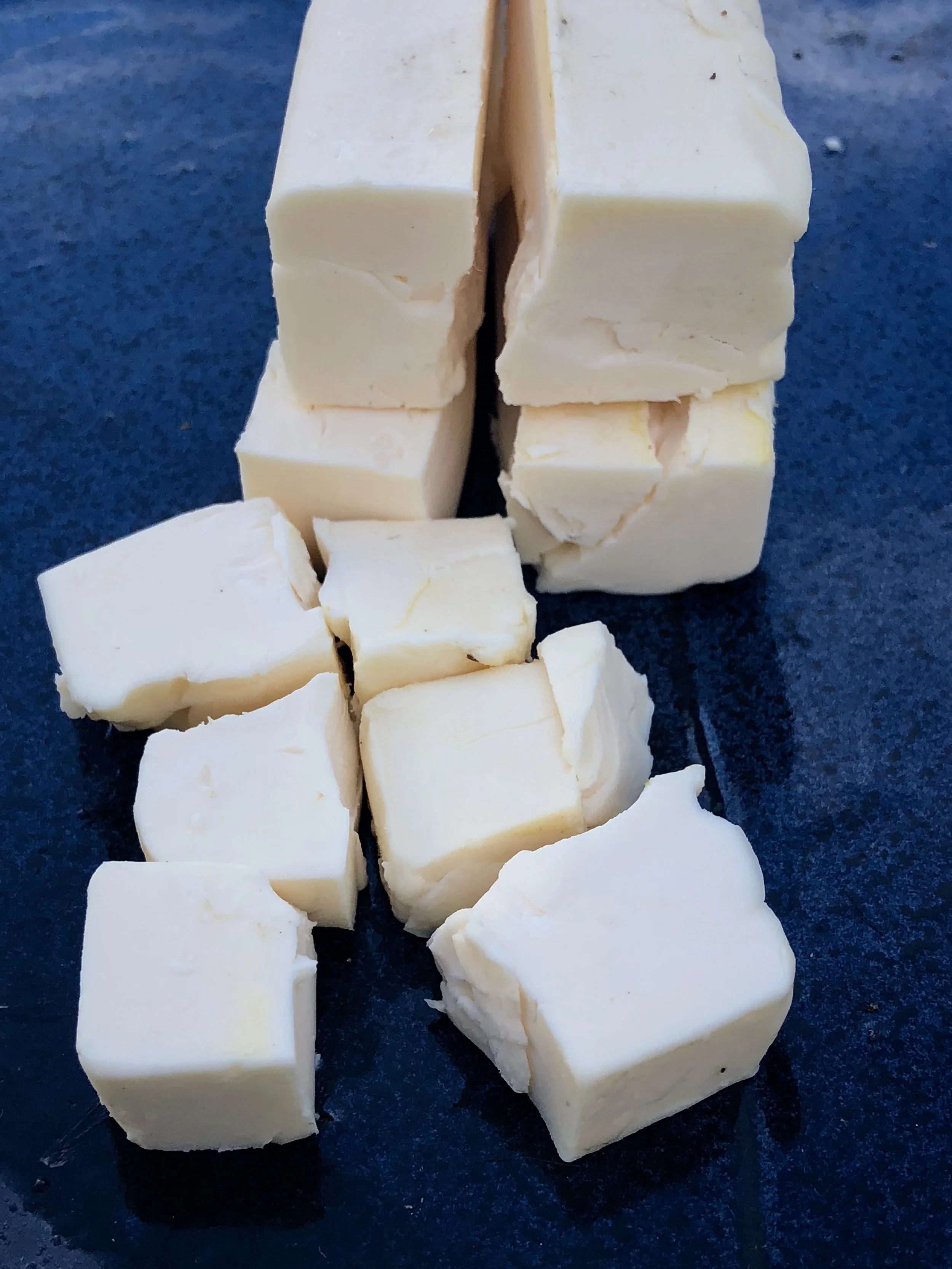 My Earth Balance stick cubed. But you don’t have to be so fancy; just chop it best you can, and then drop Into your flour mixture.