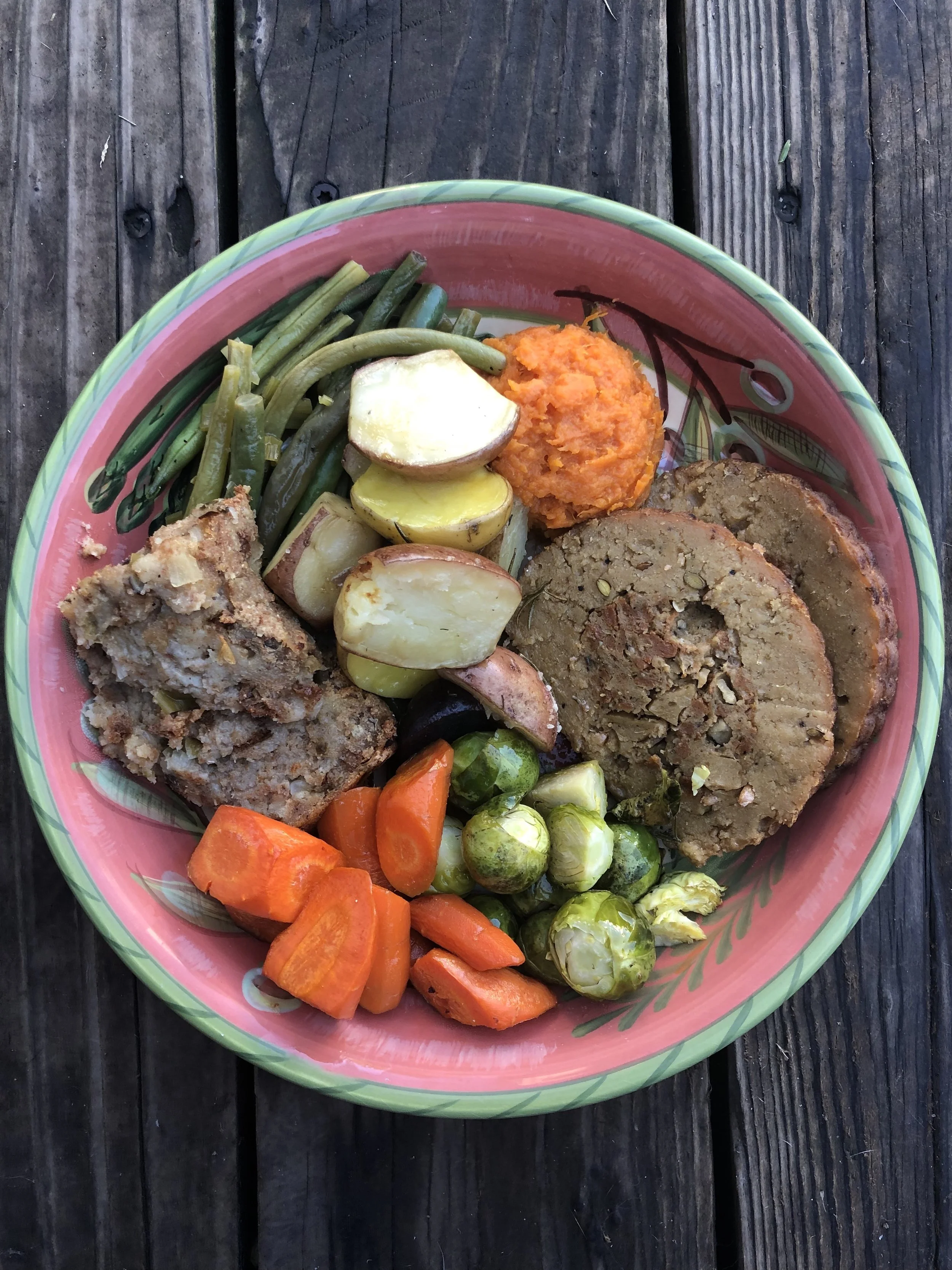Along with the Field Roast, we had mashed maple yams, green beans braised in white wine, roasted potatoes, carrots and brussel sprouts, stuffing, and the not pictured, mushroom and onion gravy. Also not pictured: the bottle of Champagne that seemed to have a hole in it.