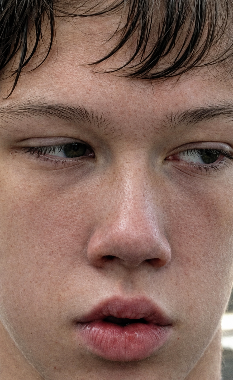 Pensive Freckled Teen Close-Up.png