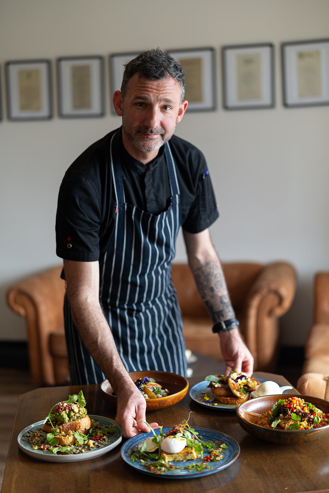 Executive Chef Andrew Sharkey preparing food at The Kitchens on the Mornington Peninsula