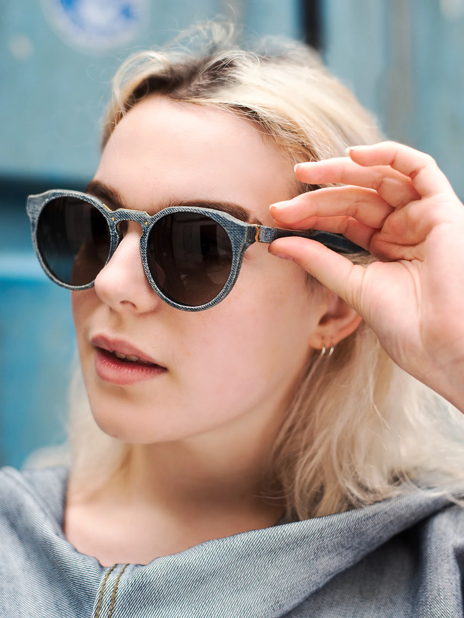 Work for Mosevic sunglasses. Glasses handmade from 100% recycled denim. Model: Kepler in blue.