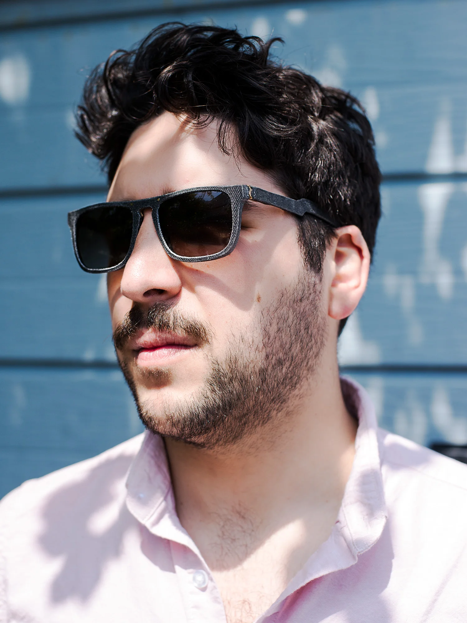 Work for Mosevic sunglasses. Glasses handmade from 100% recycled denim. Model: Titan in black.