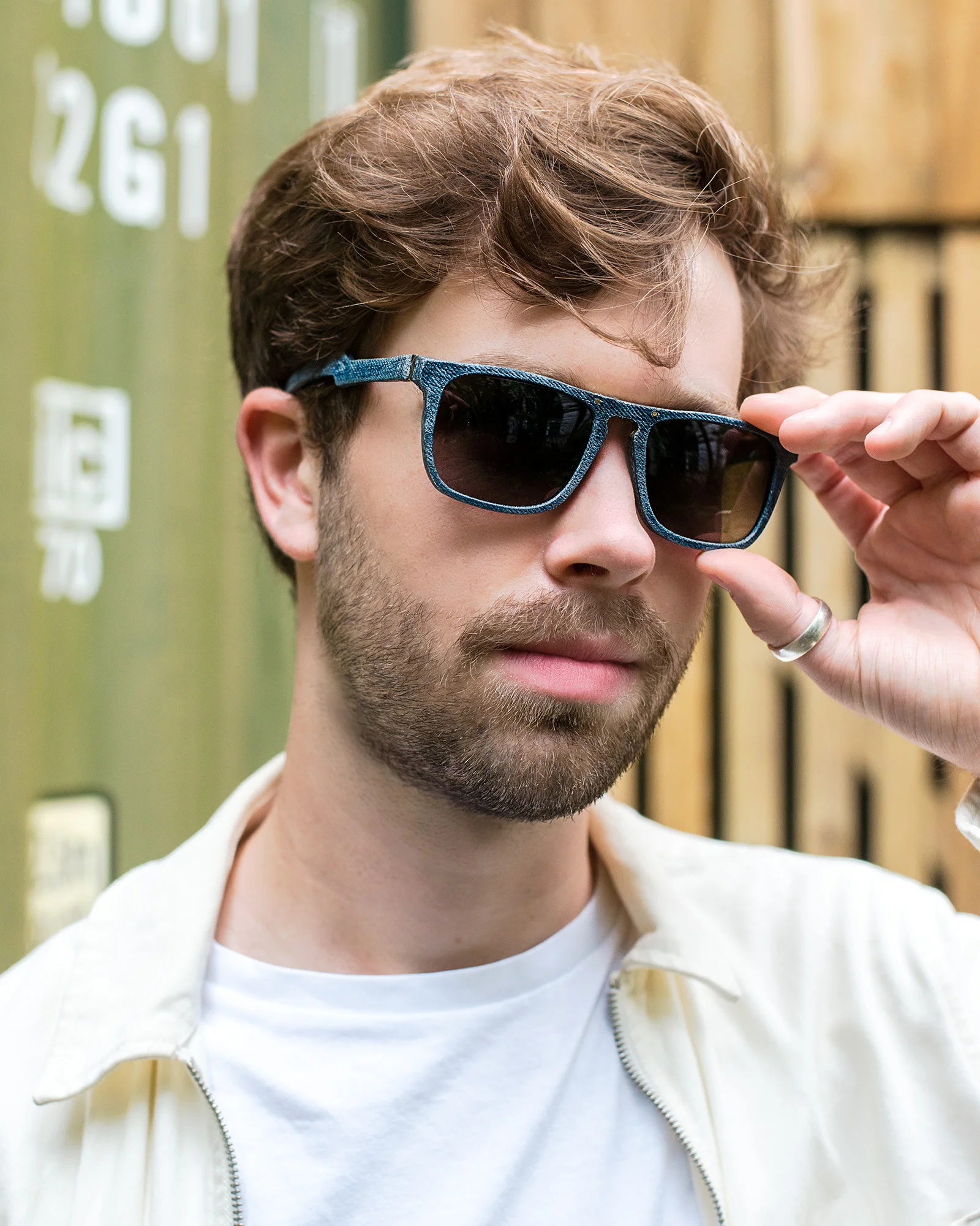 Work for Mosevic sunglasses. Glasses handmade from 100% recycled denim. Model: Titan in blue.