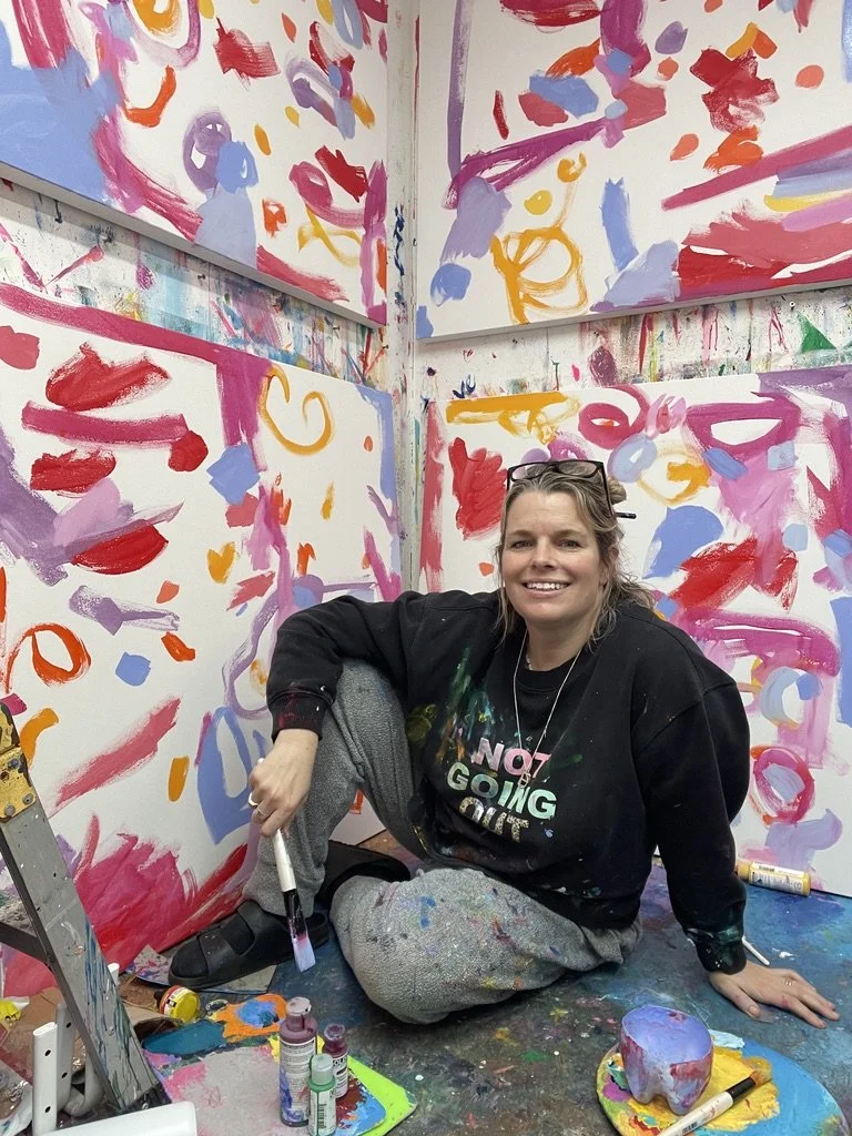 Faye Bridgwater painting flowers for the Saatchi Gallery