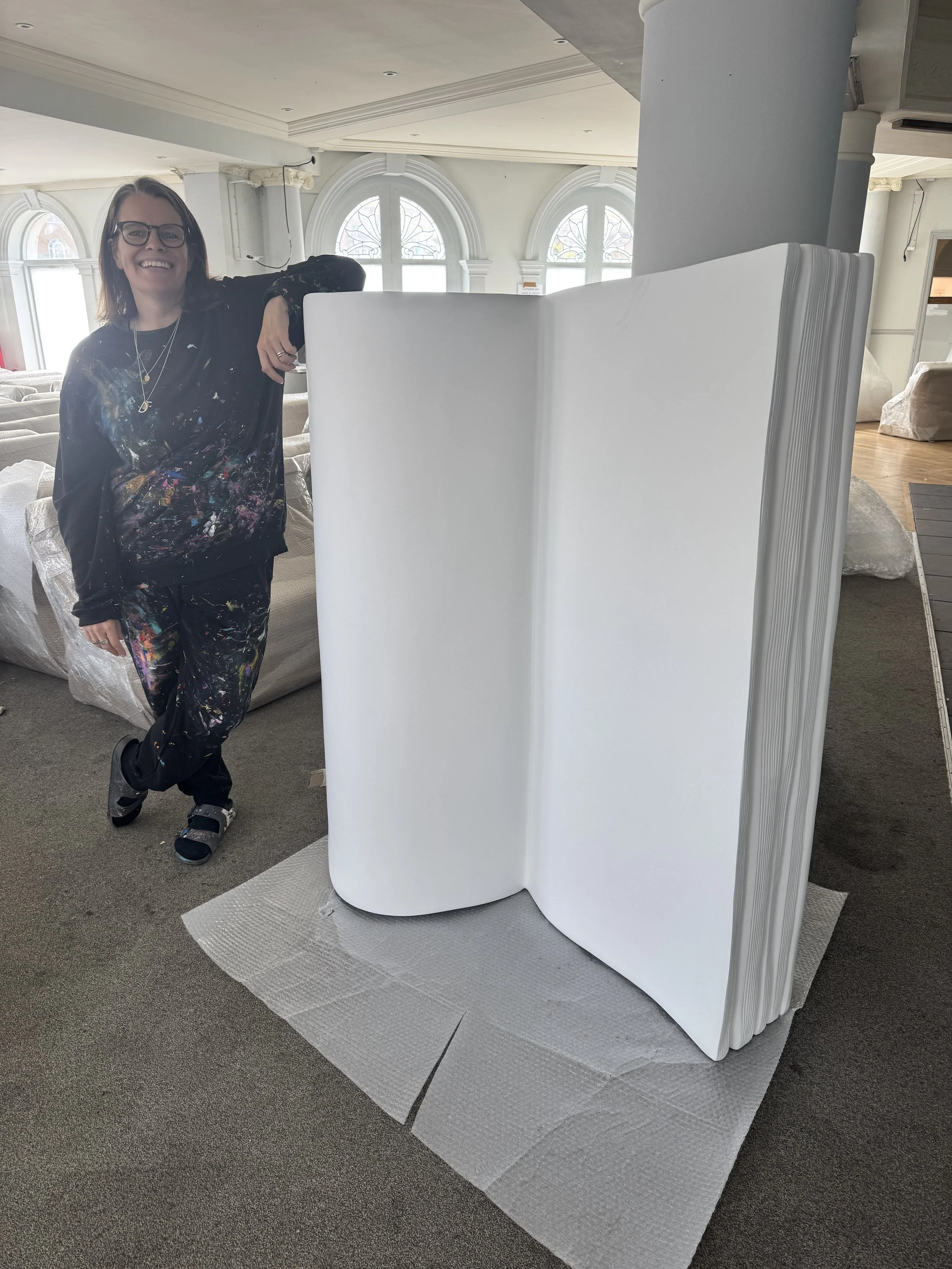 Me beginning to paint the blank BookBench at the secret location