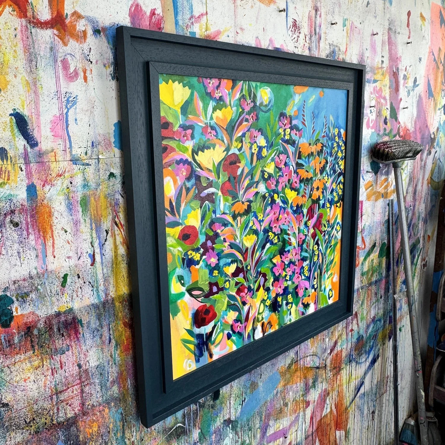 Vibrant wildflower painting with abundant blooms and lush green foliage