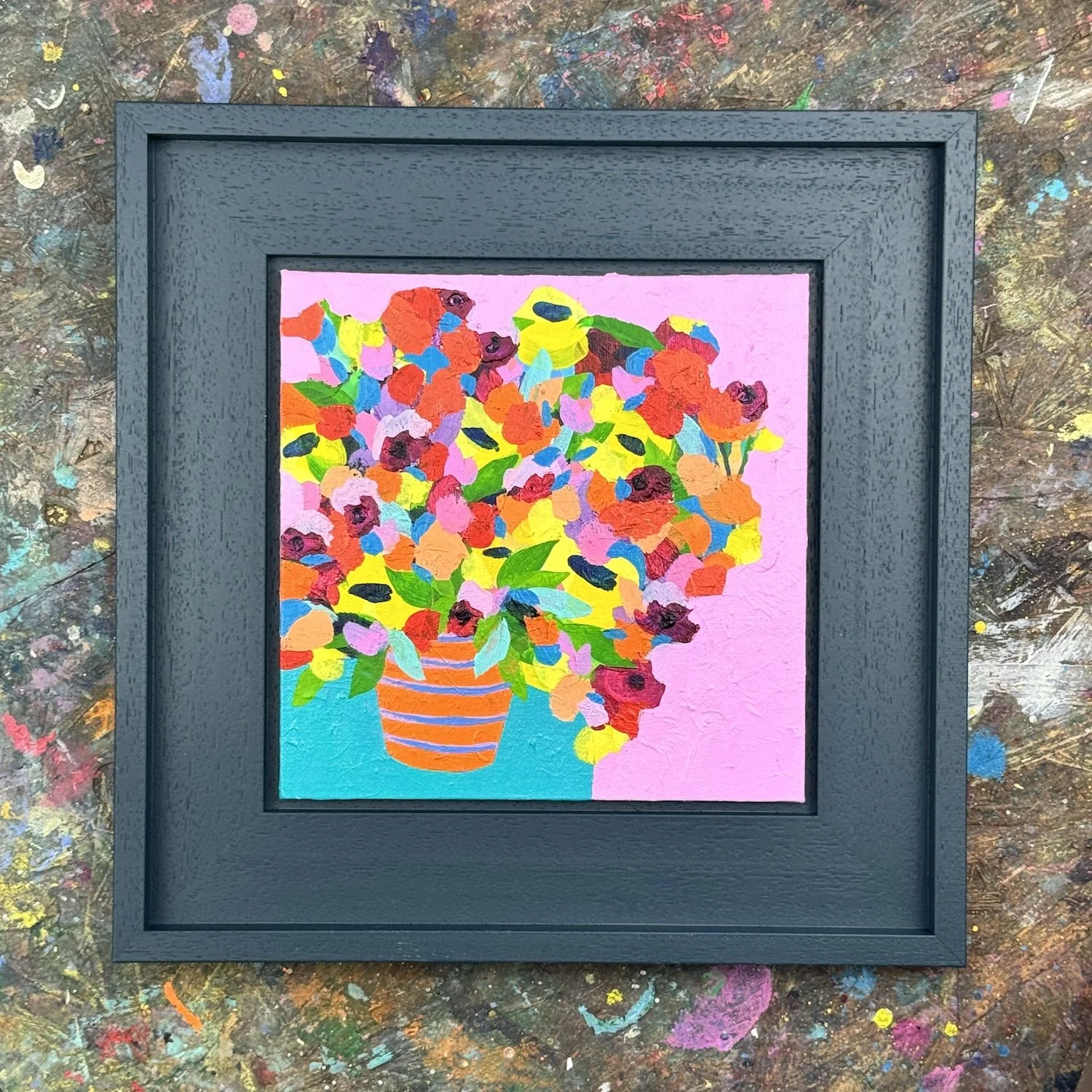 Contemporary naïve style floral artwork with bold yellow and red blooms on soft pink ground