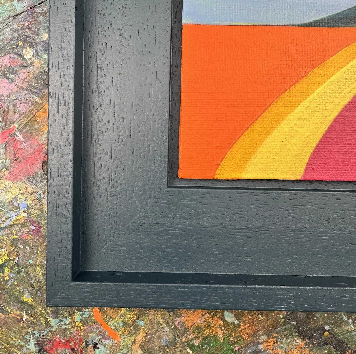 Close-up of layered colour in abstract landscape painting