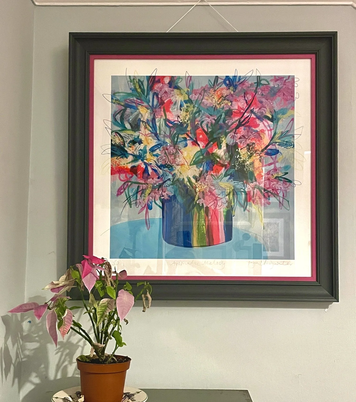 Floral painting by contemporary British artist Faye Bridgwater framed in a living space