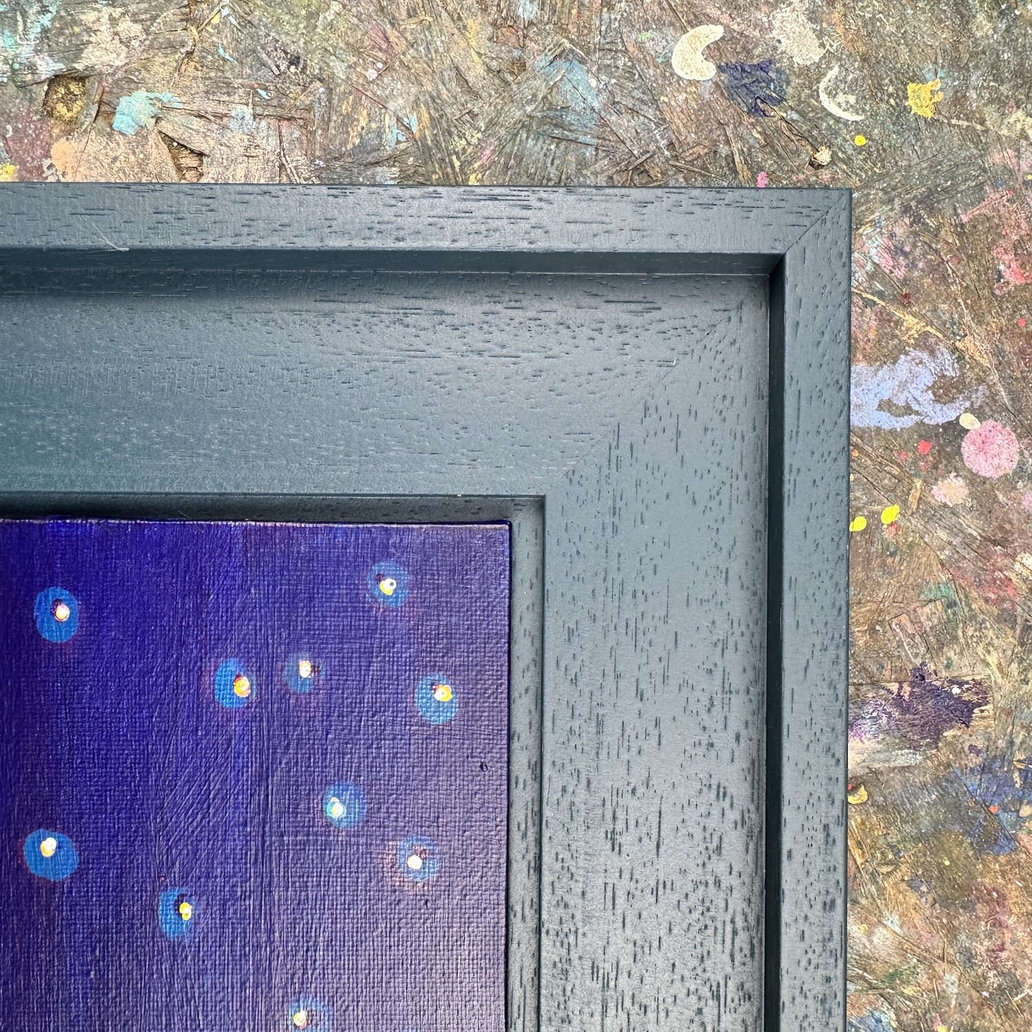 Close-up of dark layered tones in night landscape painting