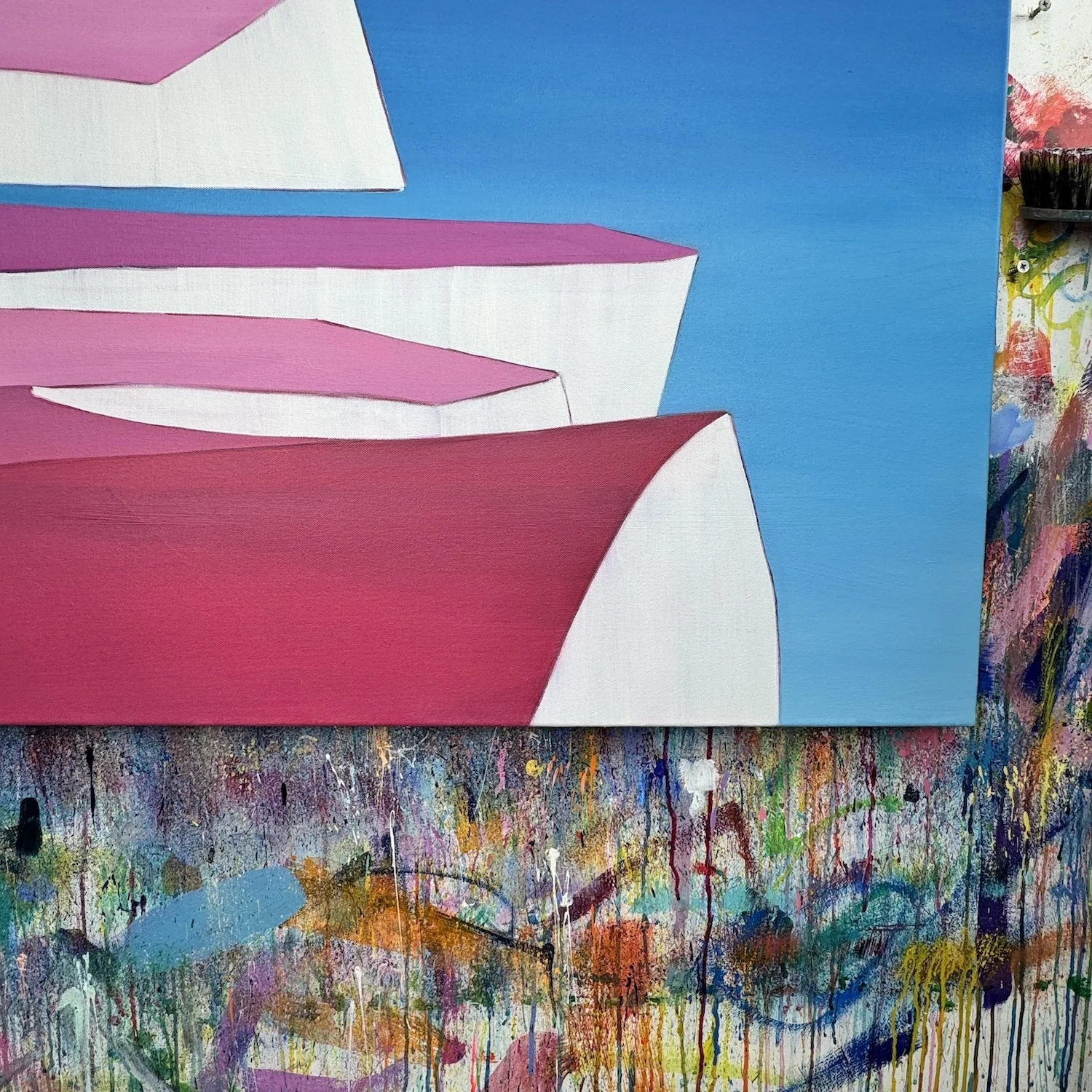 Colourful coastal painting featuring cliffs, sea and sky in layered blues and pinks