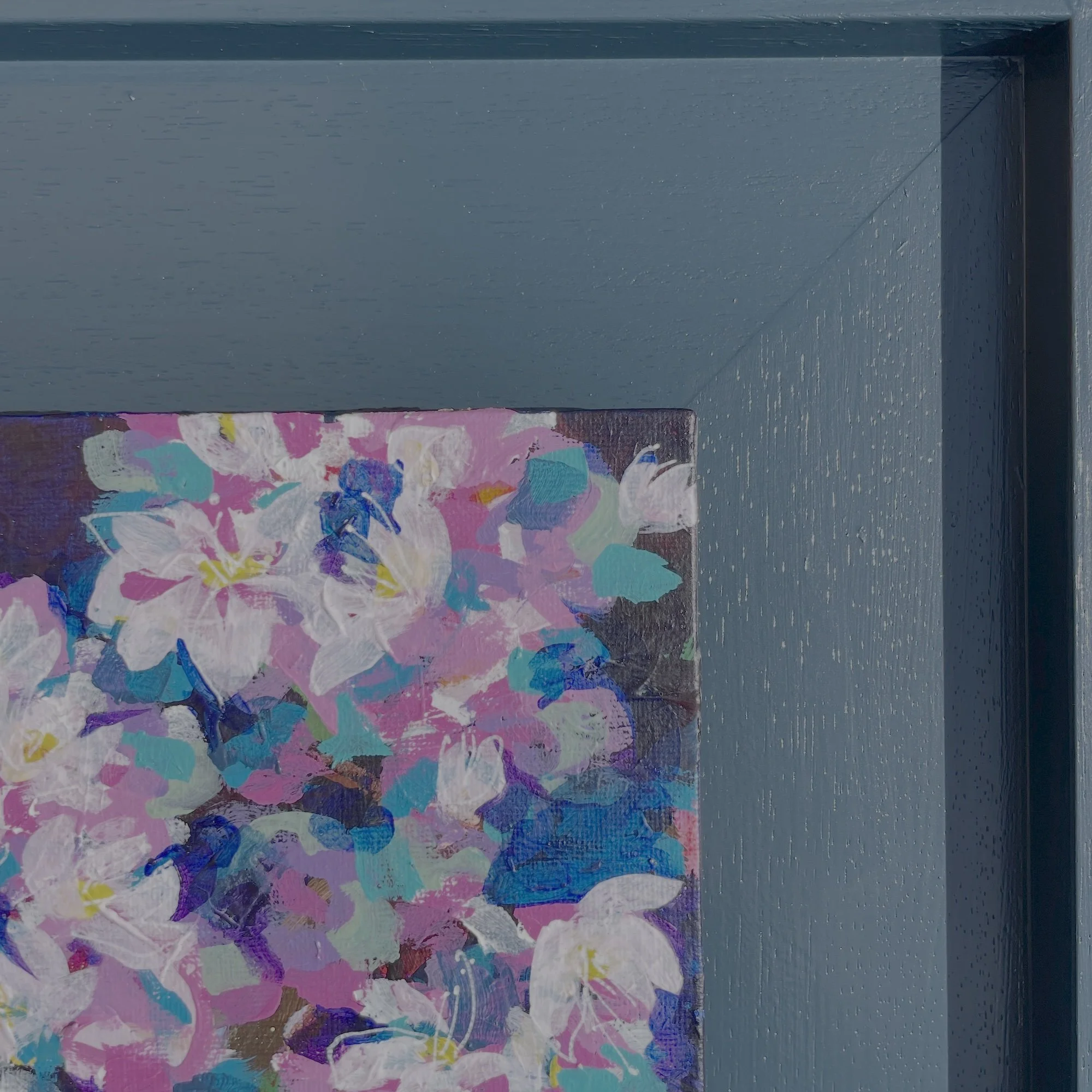 Close up of framed painting of flowers "Joy To The Eye" by Faye Bridgwater